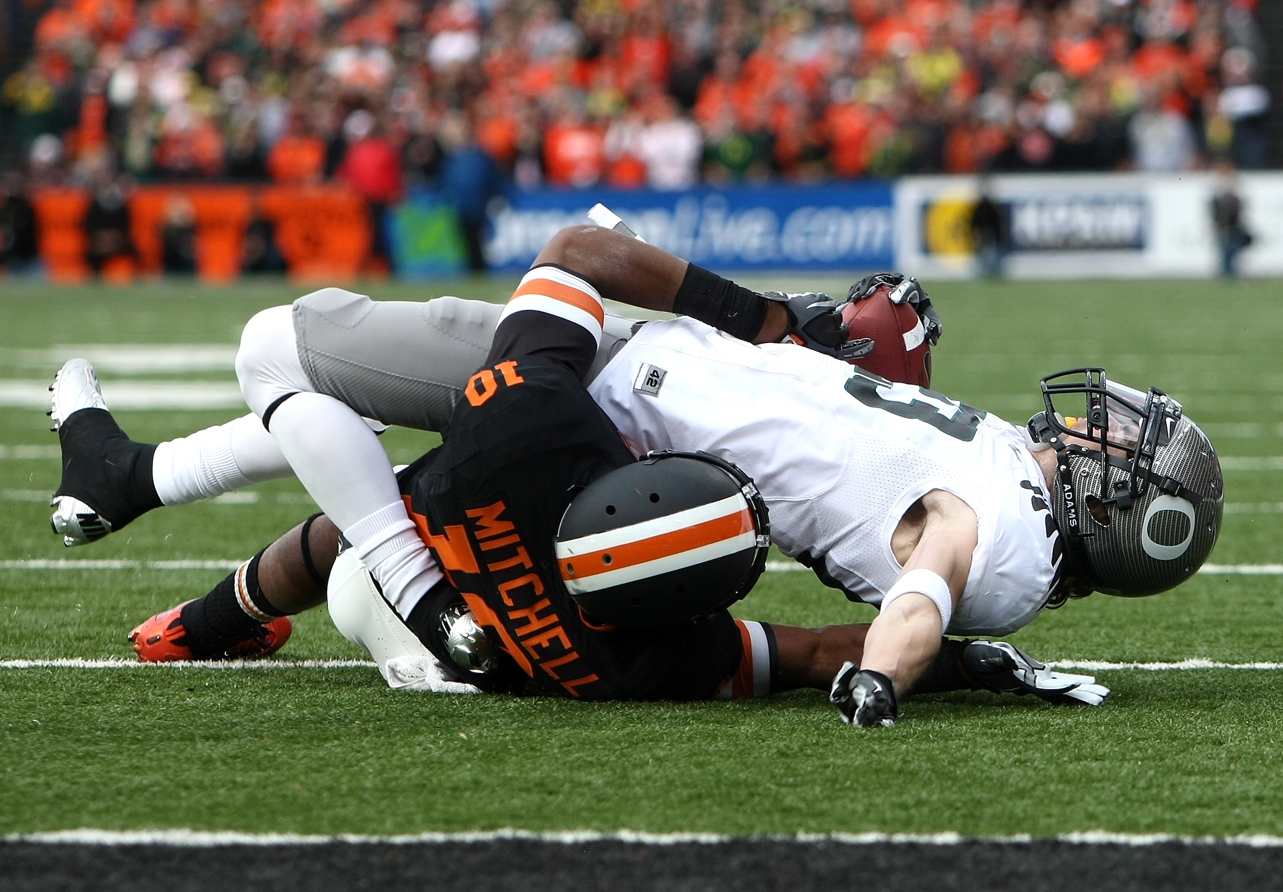 CORVALLIS, OR - DECEMBER 04: Jeff Maehl #23 of the Oregon Ducks is tackled by Lance Mitchell #10 of the Oregon State Beavers during the 114th Civil War on December 4, 2010 at the Reser Stadium in Corvallis, Oregon. (Photo by Jonathan Ferrey/Getty Images CORVALLIS, OR - DECEMBER 04: Jeff Maehl #23 of the Oregon Ducks is tackled by Lance Mitchell #10 of the Oregon State Beavers during the 114th Civil War on December 4, 2010 at the Reser Stadium in Corvallis, Oregon. (Photo by Jonathan Ferrey/Getty Images