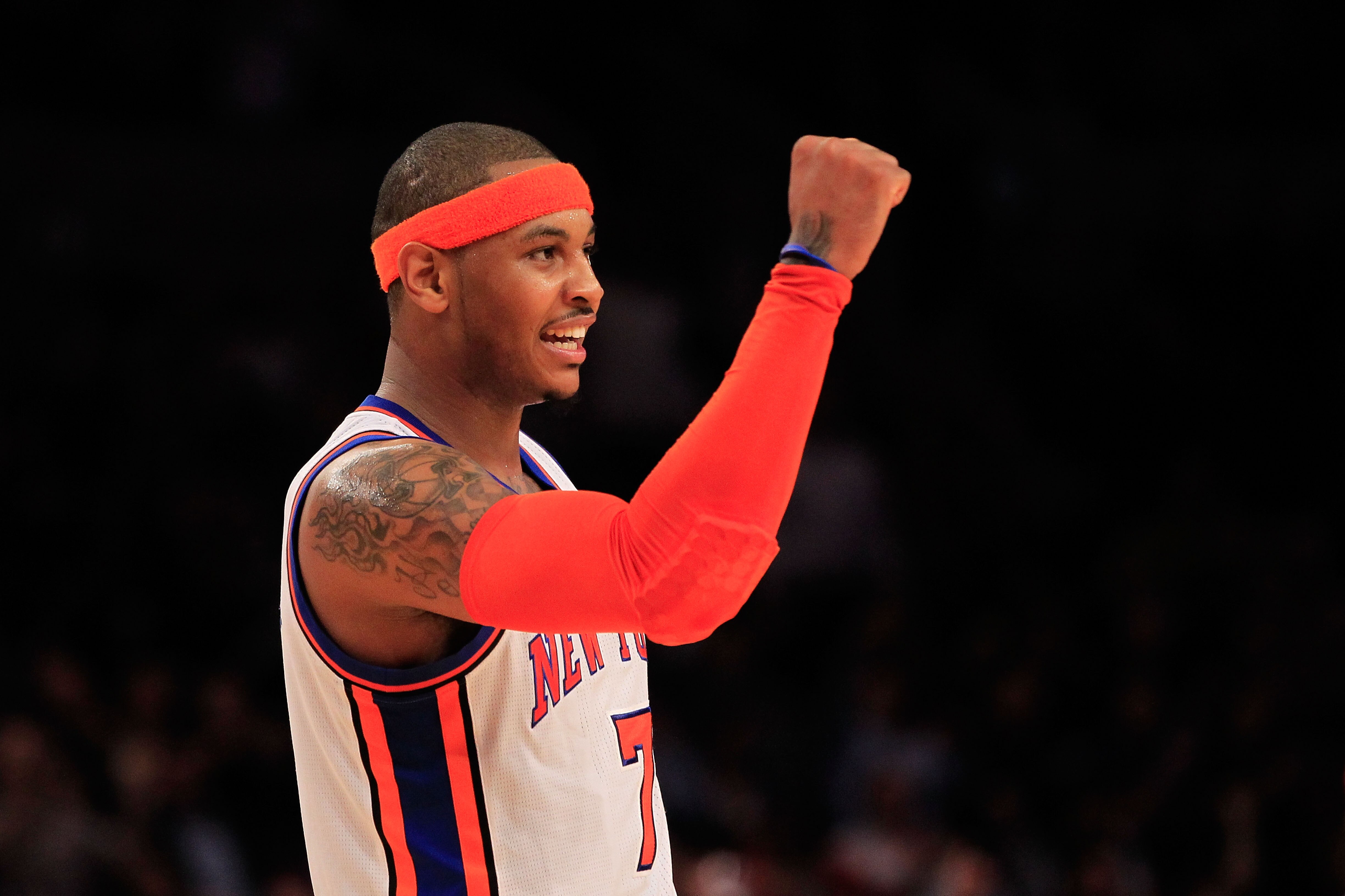 NEW YORK, NY - MARCH 30: Carmelo Anthony #7 of the New York Knicks celebrates during the game against the New Jersey Nets at Madison Square Garden on March 30, 2011 in New York City. NOTE TO USER: User expressly acknowledges and agrees that, by downloadi NEW YORK, NY - MARCH 30: Carmelo Anthony #7 of the New York Knicks celebrates during the game against the New Jersey Nets at Madison Square Garden on March 30, 2011 in New York City. NOTE TO USER: User expressly acknowledges and agrees that, by downloadi