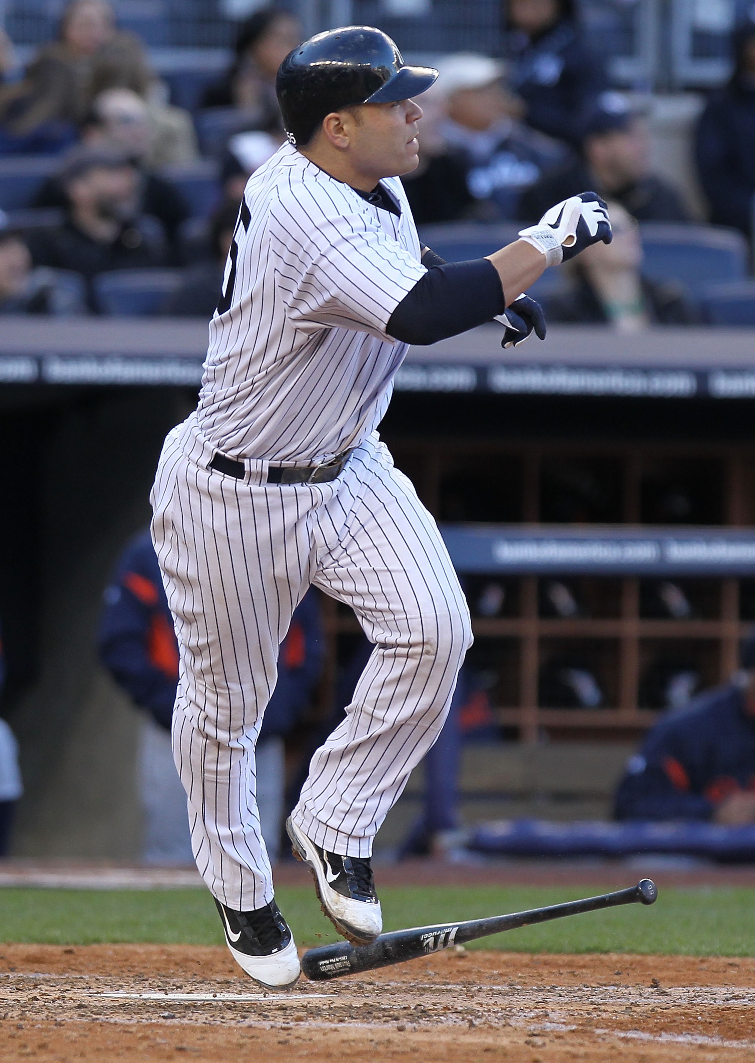 NEW YORK, NY - APRIL 02:  Russell Martin #55 of the New York Yankees hits a 3 RBI homerun in the fifth inning against the Detroit Tigers at Yankee Stadium on April 2, 2011 in the Bronx borough of New York City.  (Photo by Nick Laham/Getty Images)