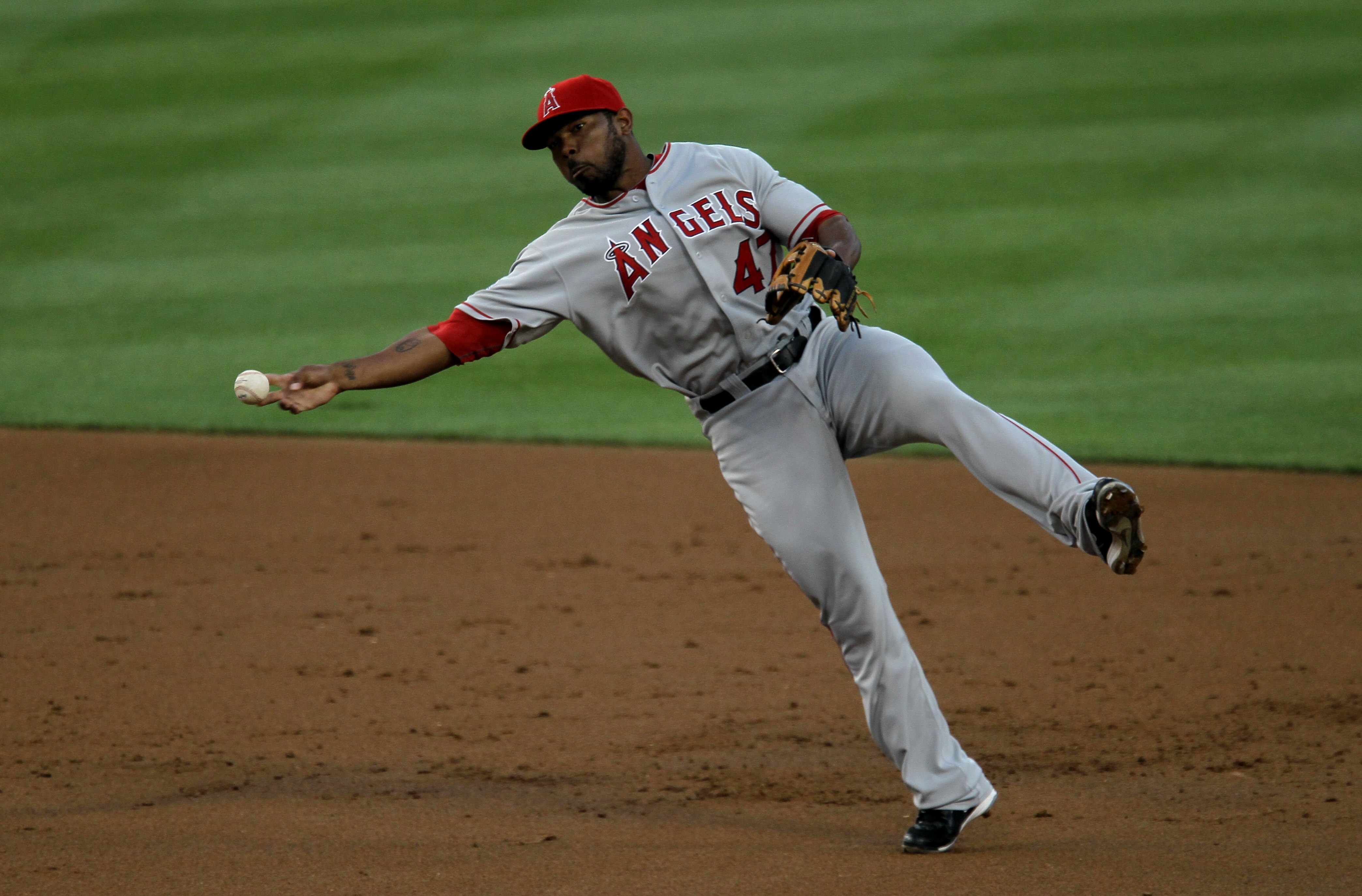 LOS ANGELES - JUNE 12:  Second baseman Howie Kendrick #47 of the Los Angeles Angels of Anaheim throws to first after fielding  a ground ball from James Loney #7 of the Los Angeles Dodgers on June 12, 2010 at Dodger Stadium in Los Angeles, California.   (P
