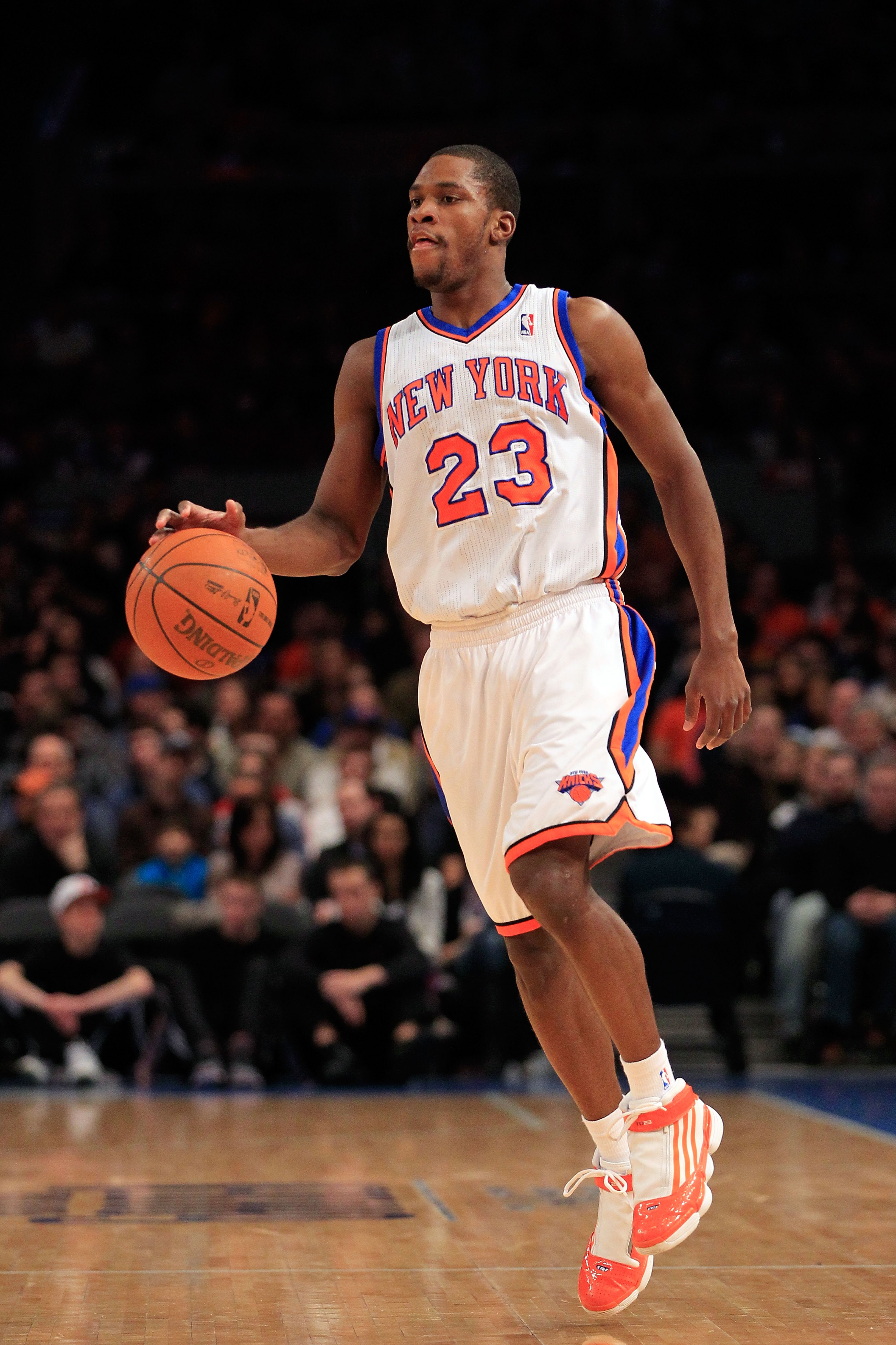 NEW YORK, NY - FEBRUARY 06:  Toney Douglas #23 of the New York Knicks dribbles the ball against the Philadelphia 76ers at Madison Square Garden on February 6, 2011 in New York City. NOTE TO USER: User expressly acknowledges and agrees that, by downloading