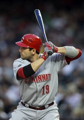 PHOENIX, AZ - APRIL 08:  Joey Votto #19 of the Cincinnati Reds at bat during the Major League Baseball home opening game against the Arizona Diamondbacks at Chase Field on April 8, 2011 in Phoenix, Arizona. The Diamondbacks defeated the Reds 13-2.  (Photo
