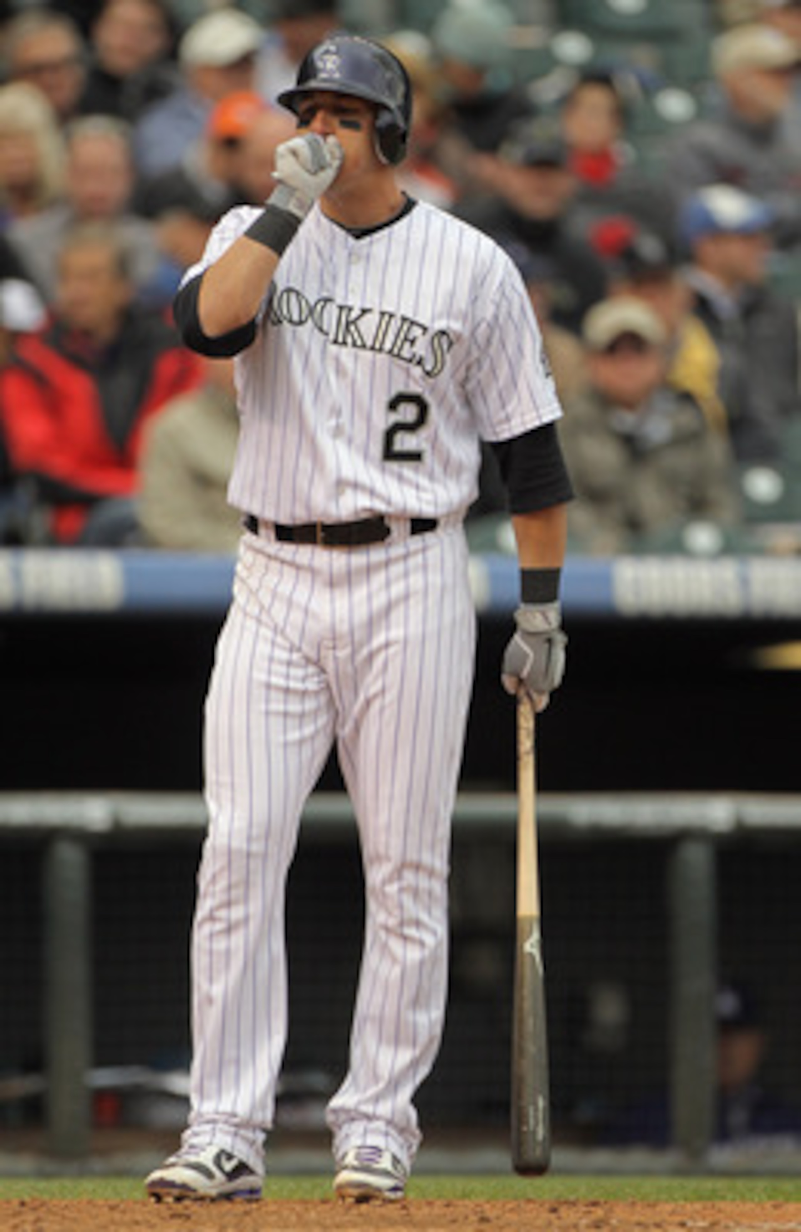 DENVER, CO - APRIL 06:  Troy Tulowitzki #2 of the Colorado Rockies prepares to take an at bat against the Los Angeles Dodgers at Coors Field on April 6, 2011 in Denver, Colorado.  (Photo by Doug Pensinger/Getty Images)