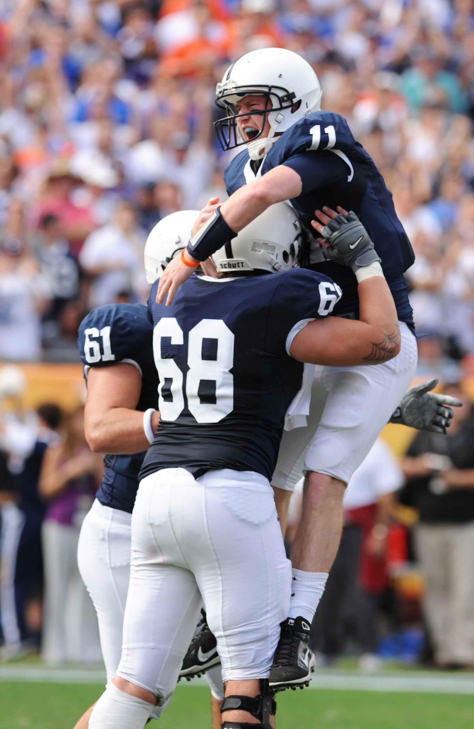 TAMPA, FL - JANUARY 1:  Quarterback Matt McGloin #11 of the Penn State Nittany Lions celebrates a touchdown pass against the Florida Gators January 1, 2011 in the 25th Outback Bowl at Raymond James Stadium in Tampa, Florida.  (Photo by Al Messerschmidt/Ge