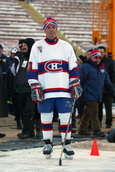 EDMONTON, CANADA - NOVEMBER 22:  Guy Lafleur #10 of the Montreal Canadiens waits to skate onto the ice surface prior to taking on the Edmonton Oilers in the Molson Canadien Heritage Classic Megastars Game on November 22, 2003 at Commonwealth Stadium in Ed