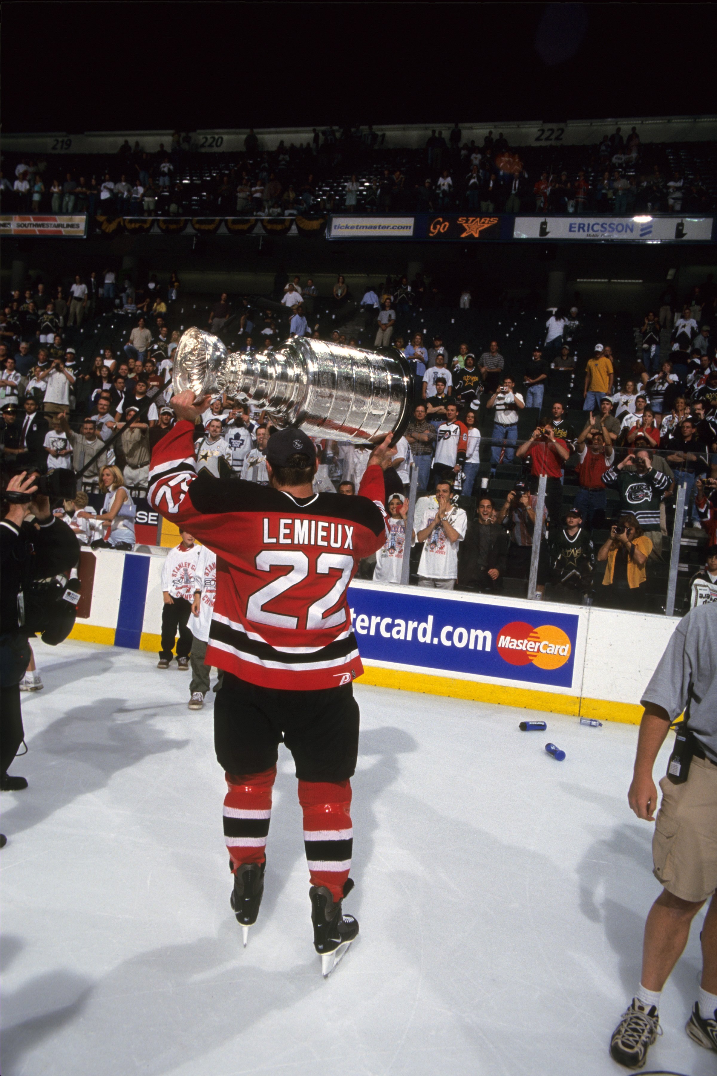 DALLAS - JUNE 10: Claude Lemieux #22 of the New Jersey Devils celebrates with the Stanley Cup Trophy as he skates around the rink after winning the 2000 Stanley Cup Finals game against the Dallas Stars at Reunion Arena on June 10, 2000 in Dallas, Texas. (