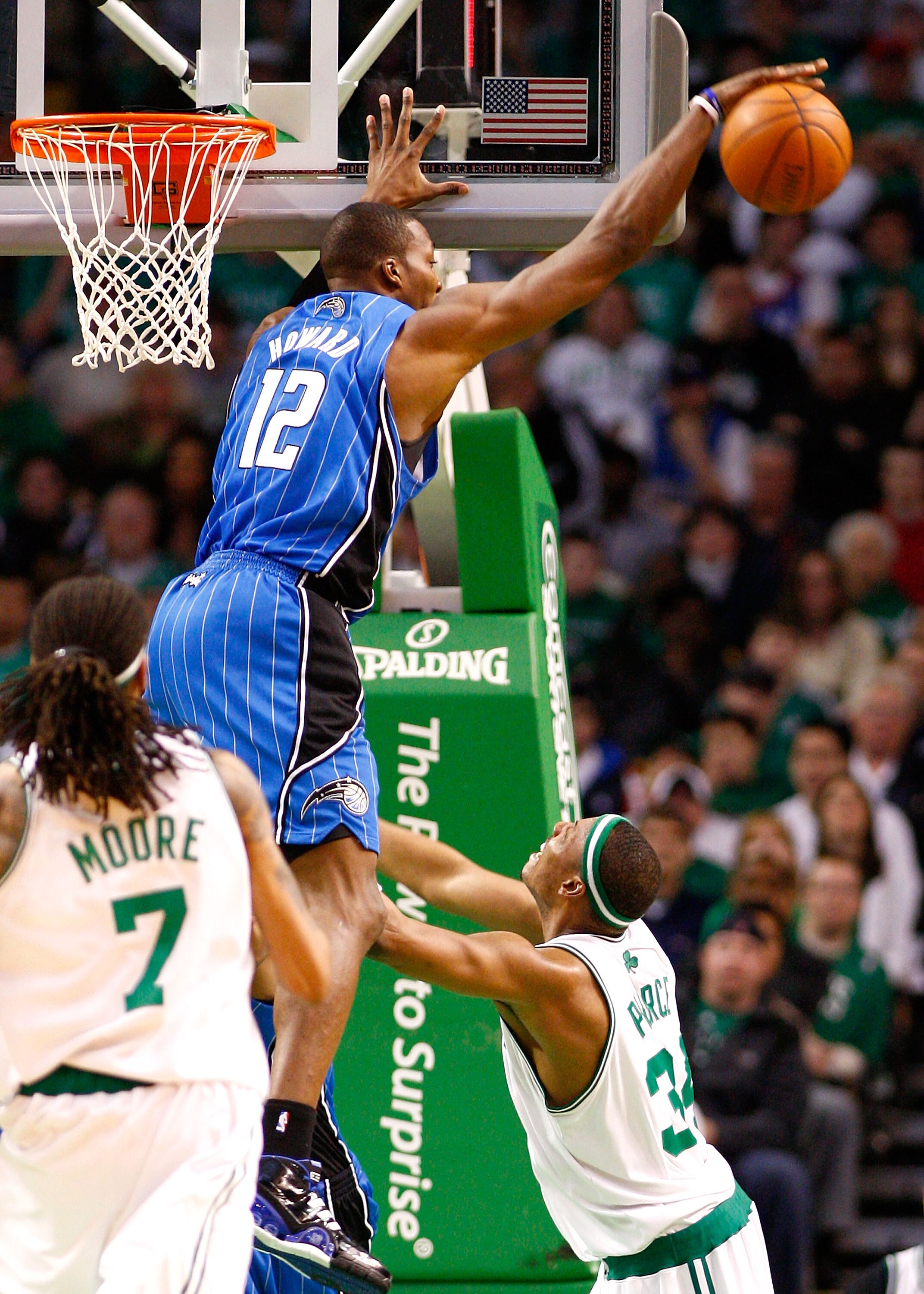 BOSTON, MA - MARCH 8: Dwight Howard #12 of the Orlando Magic blocks a shot by Paul Pierce #34 of the Boston Celtics at the TD Banknorth Garden on March 8, 2009 in Boston, Massachusetts. The Celtics lost 86-79. NOTE TO USER: User expressly acknowledges and