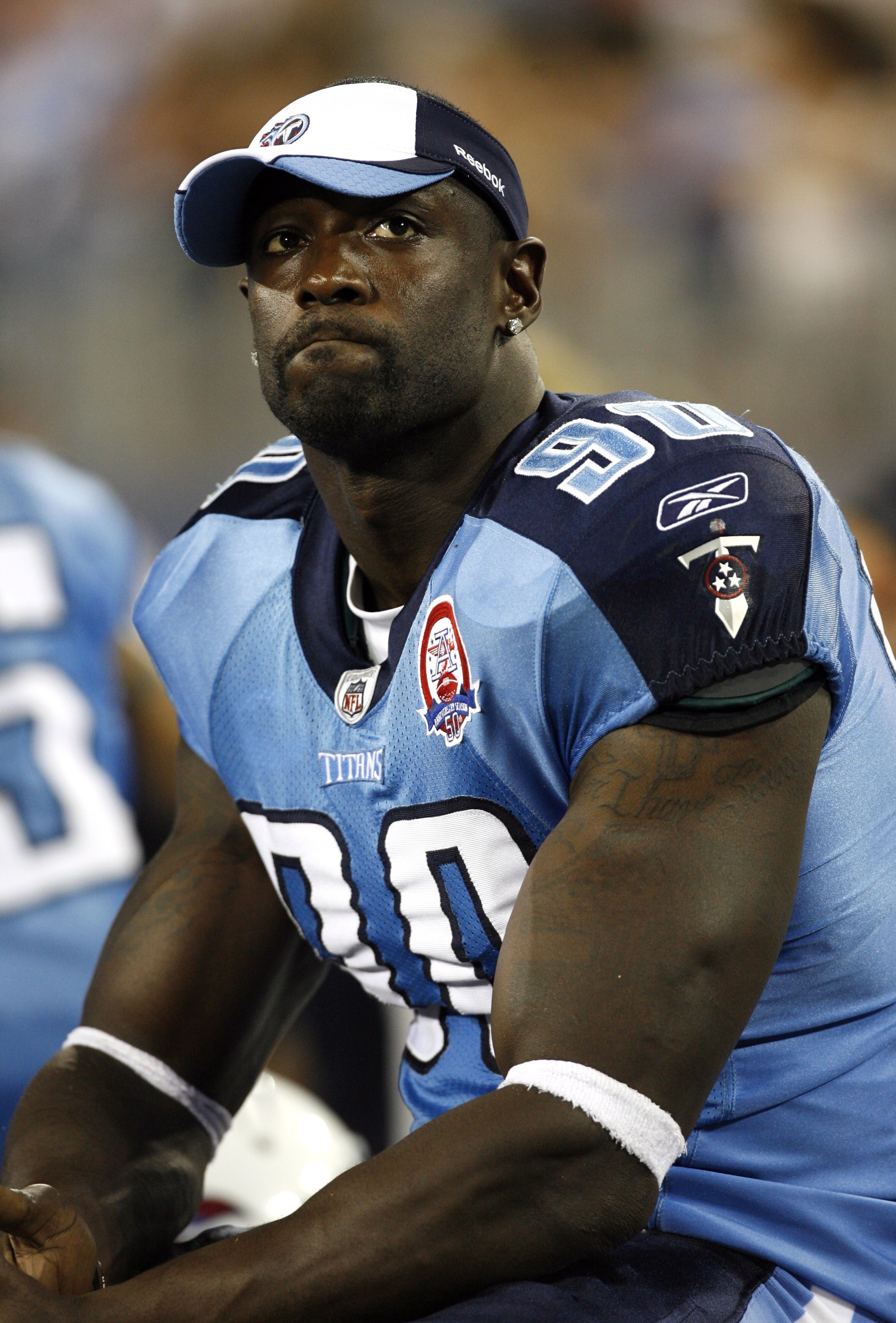 NASHVILLE, TN - AUGUST 15: Jevon Kears #90 of the Tennessee Titans looks on against the Tampa Bay Buccaneers during a preseason NFL game at LP Field on August 15, 2009 in Nashville, Tennessee. The Titans beat the Buccaneers 27-20. (Photo by Joe Murphy/Get