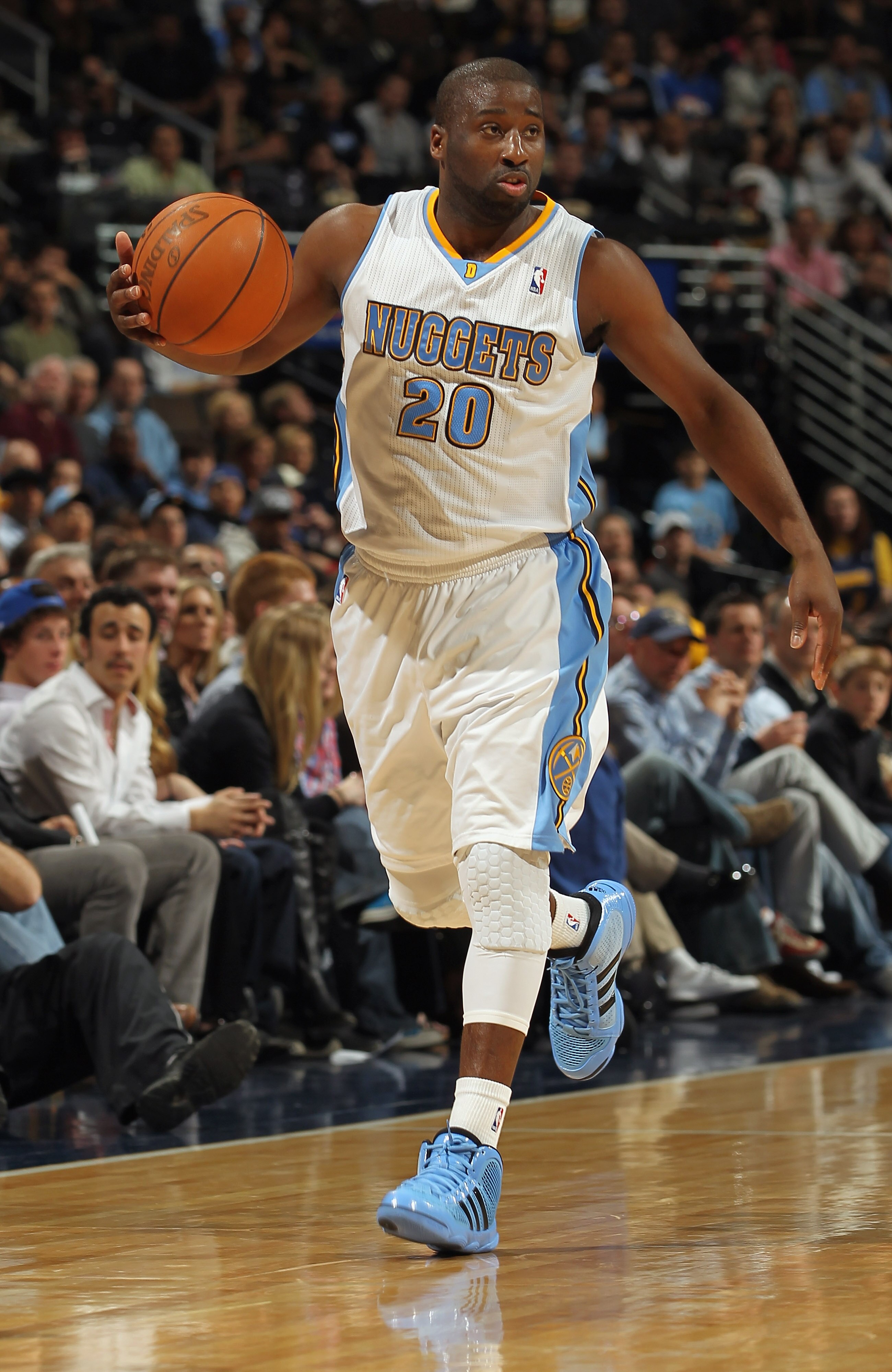 DENVER, CO - MARCH 23:  Raymond Felton #20 of the Denver Nuggets controls the ball against the San Antonio Spurs at the Pepsi Center on March 23, 2011 in Denver, Colorado. The Nuggets defeated the Spurs 115-112. NOTE TO USER: User expressly acknowledges a