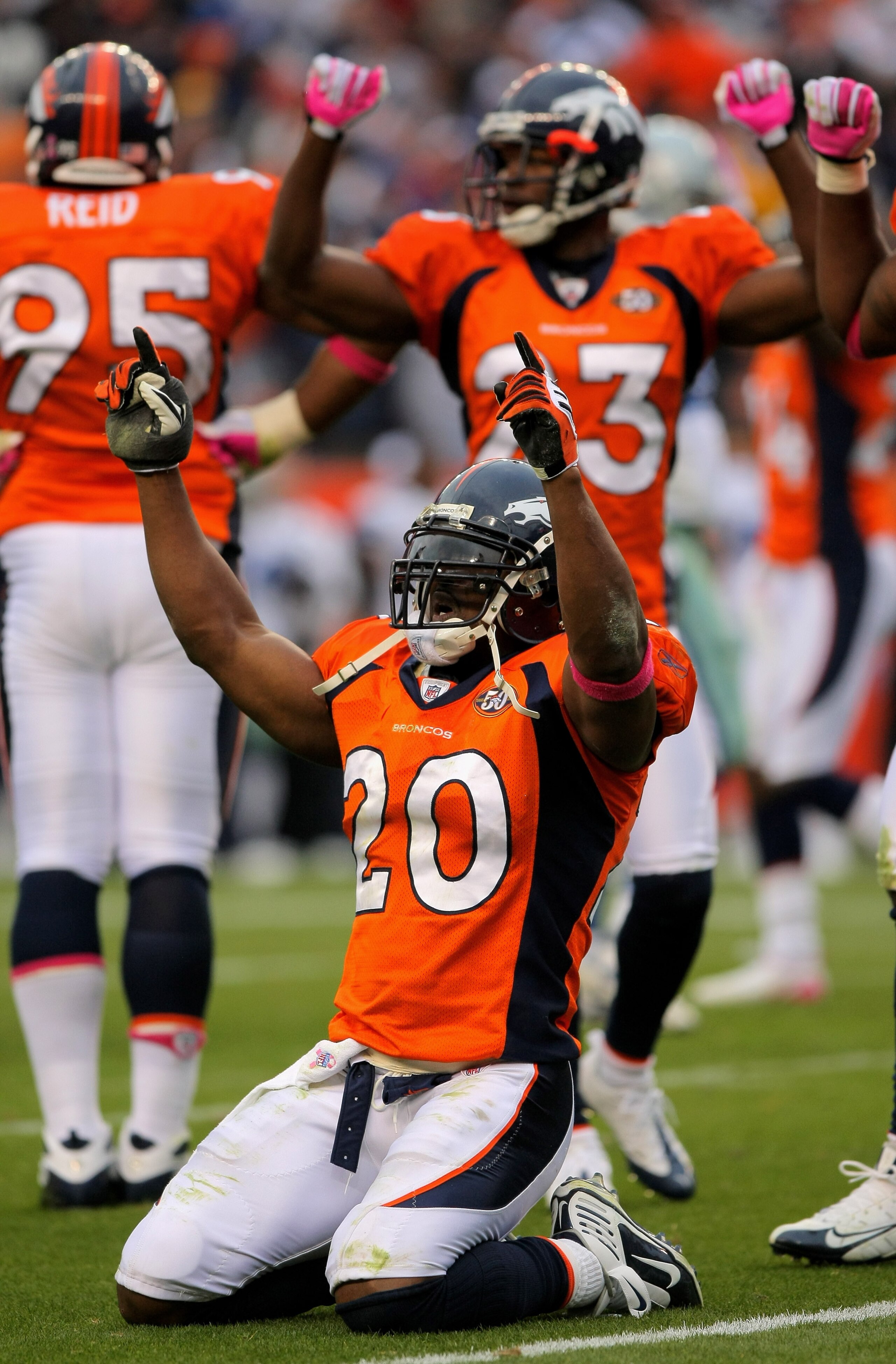 DENVER - OCTOBER 04: Brian Dawkins #20 and Renaldo Hill #23 of the Denver Broncos celebrate after the Dallas Cowboys on fourth down with :01 second remaining in the game during NFL action at Invesco Field at Mile High on October 4, 2009 in Denver, Colora DENVER - OCTOBER 04: Brian Dawkins #20 and Renaldo Hill #23 of the Denver Broncos celebrate after the Dallas Cowboys on fourth down with :01 second remaining in the game during NFL action at Invesco Field at Mile High on October 4, 2009 in Denver, Colora