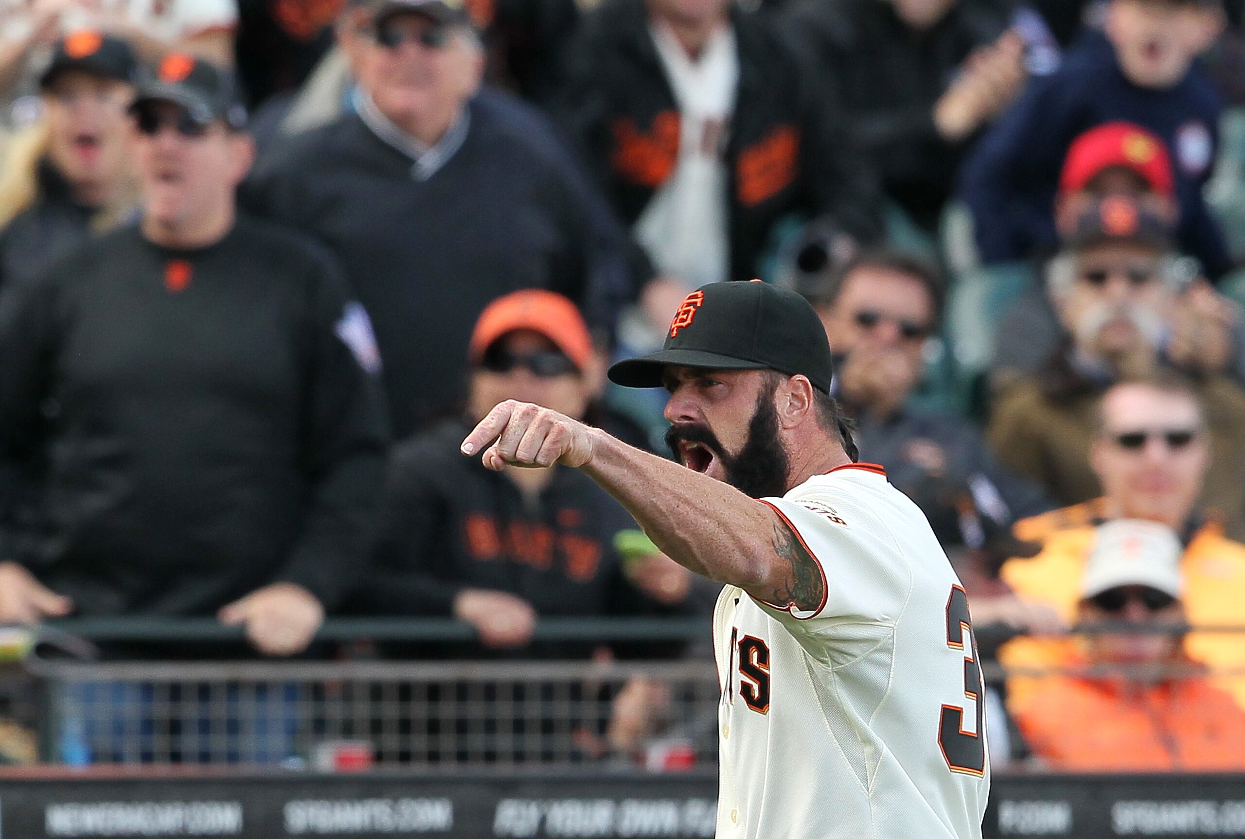 SAN FRANCISCO, CA - APRIL 08:  Brian Wilson #38 of the San Francisco Giants yells at home plate umpire Gary Darling as he leaves the game during the ninth inning against the St. Louis Cardinals at AT&T Park on April 8, 2011 in San Francisco, California. T