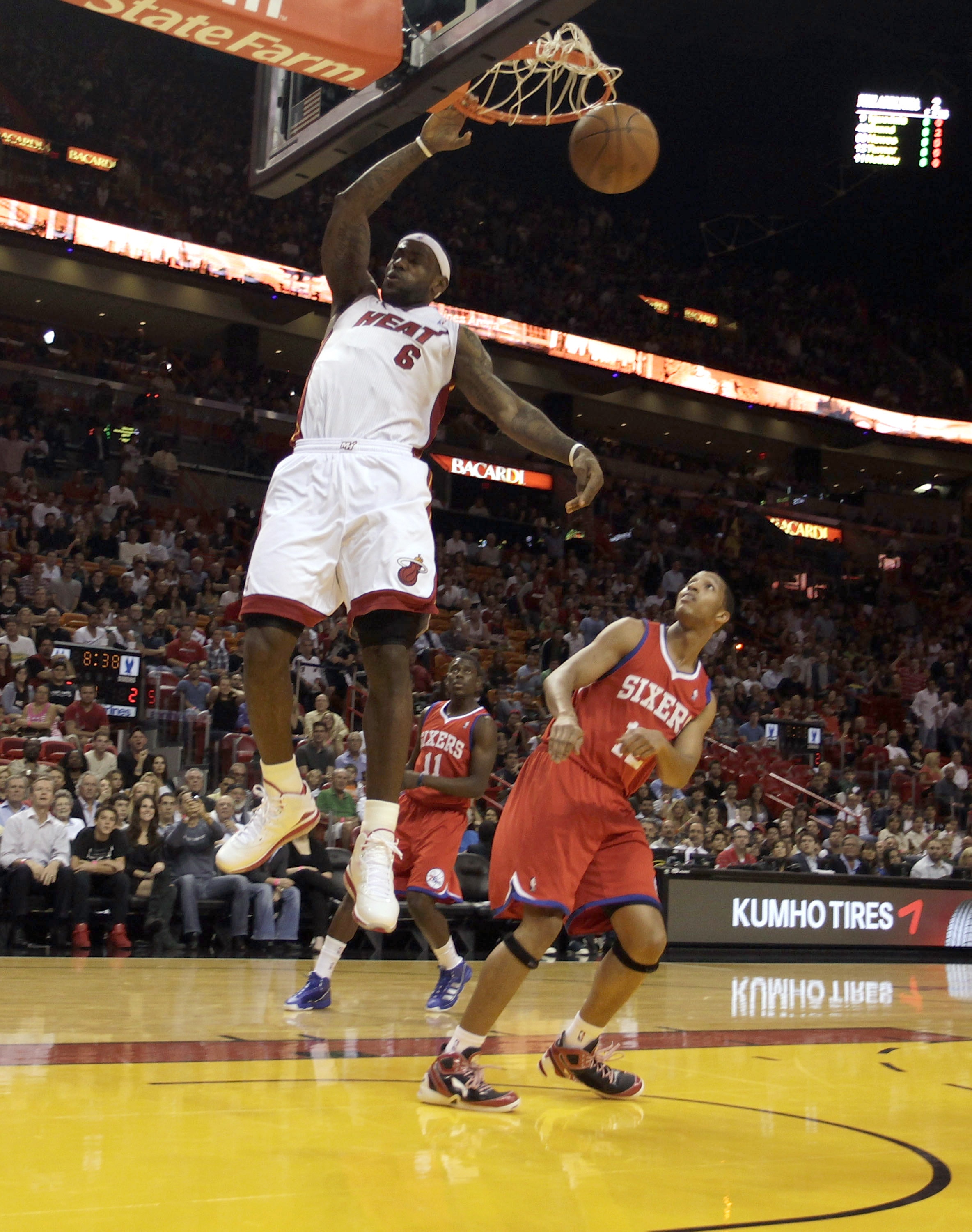 MIAMI - NOVEMBER 26:  Forward LeBron James #6 of the Miami Heat dunks against Evan Turner #12 of the Philadelphia 76ers at American Airlines Arena on November 26, 2010 in Miami, Florida.  (Photo by Marc Serota/Getty Images)