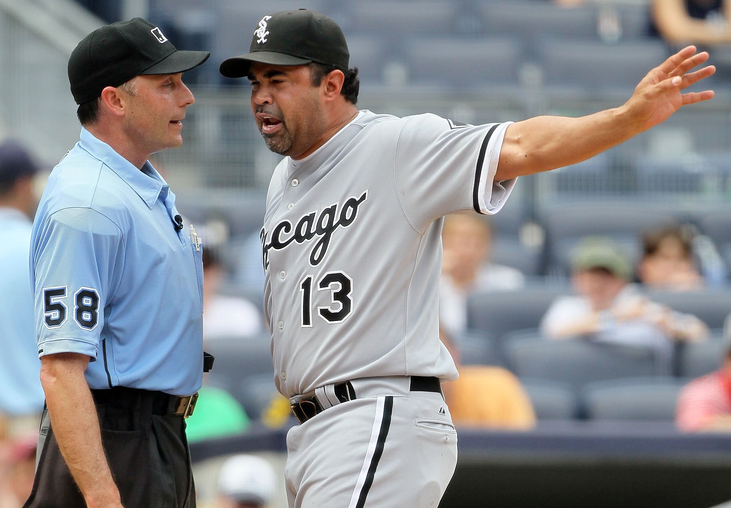 NEW YORK - MAY 02:  Manager Ozzie Guillen of the Chicago White Sox argues with home plate umpire Dan Iassogna during the game against the New York Yankees on May 2, 2010 at Yankee Stadium in the Bronx borough of New York City. The Yankees defeated the Whi