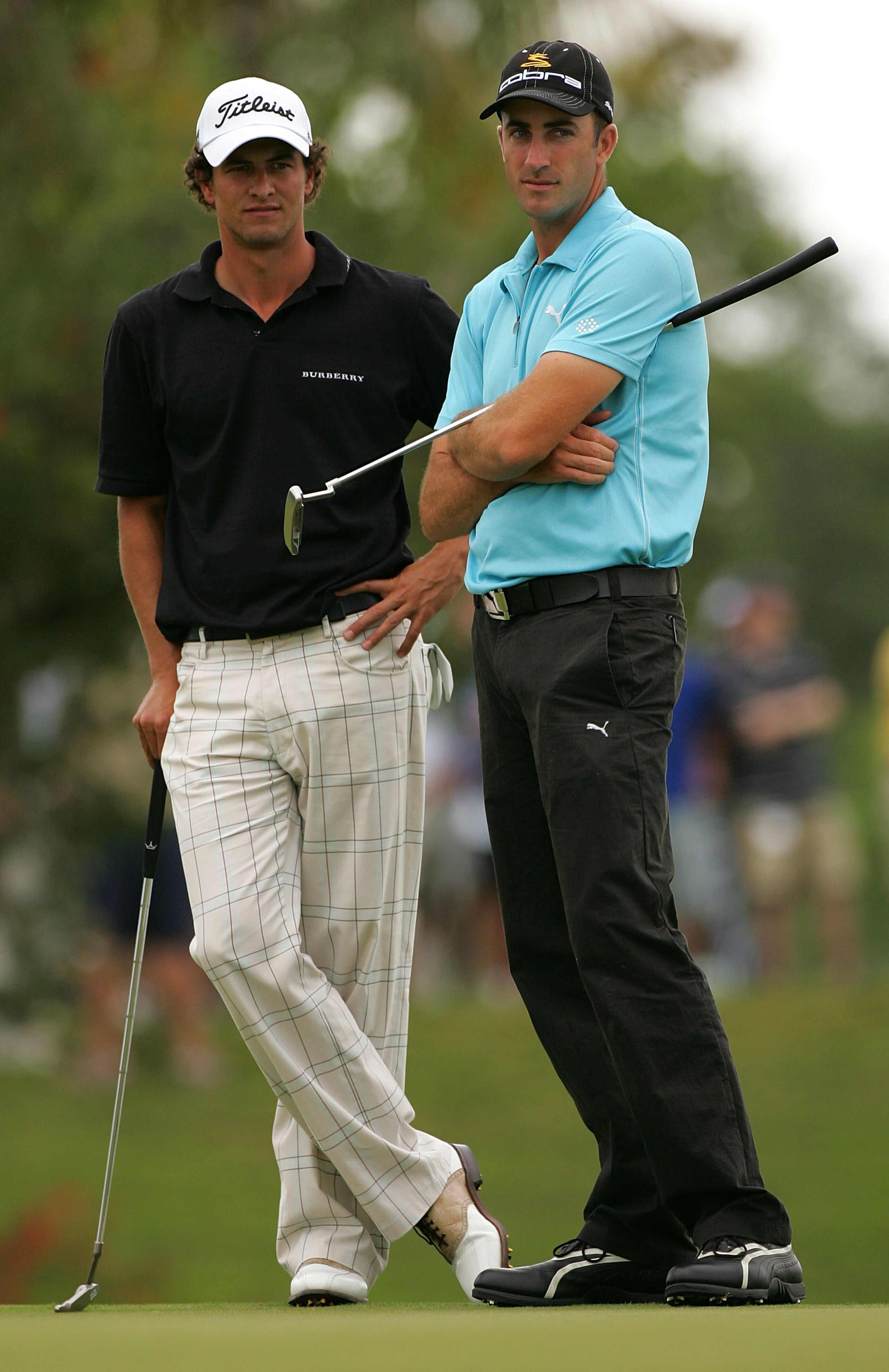 MIAMI - MARCH 22:  Adam Scott (L) of Australia and Geoff Ogilvy of Australia wait on the 3rd hole during the third round of the World Golf Championships CA Championship at the Doral Golf Resort & Spa on March 22, 2008 in Miami, Florida.  (Photo by Sam Gre