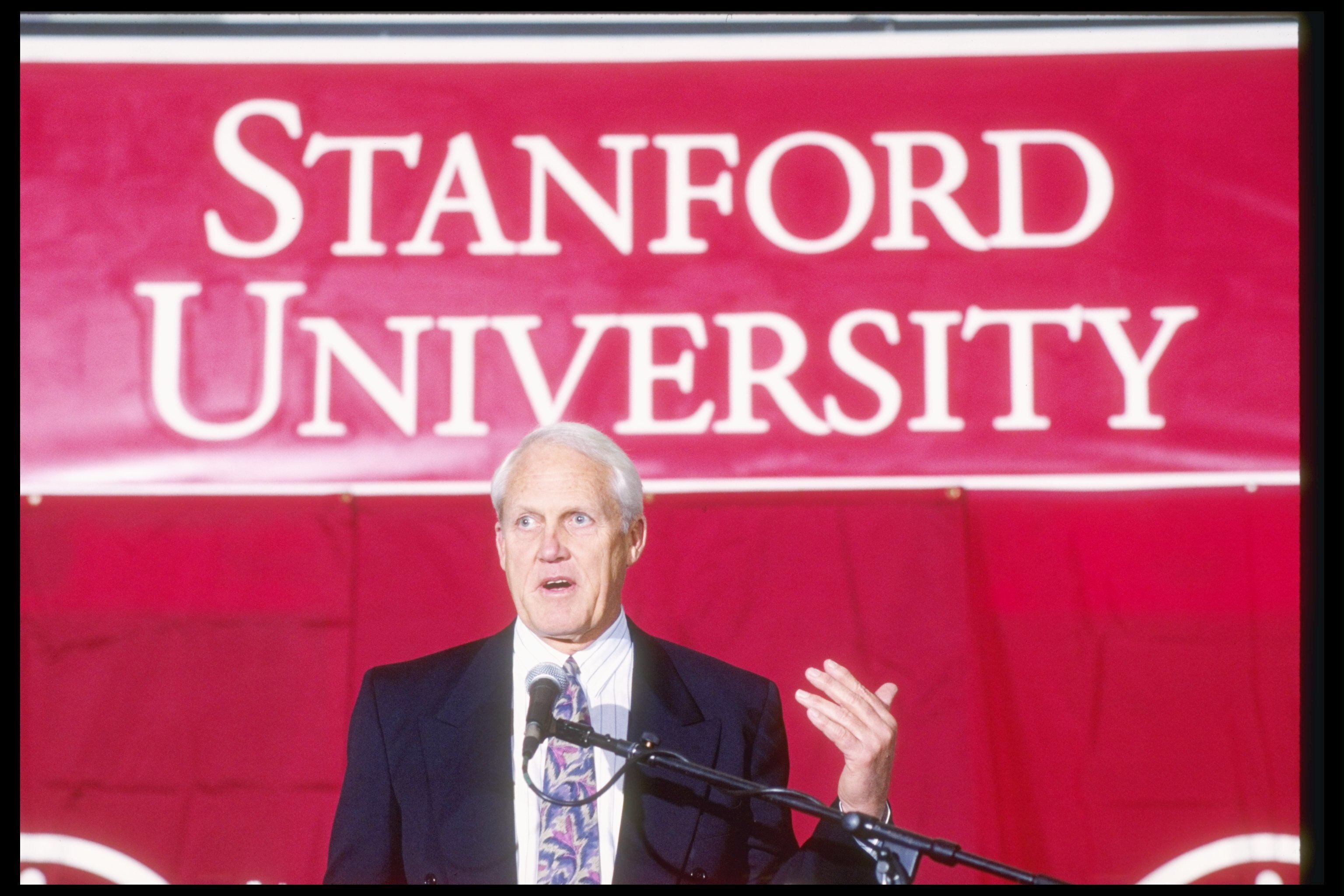 16 Jan 1992:  Coach Bill Walsh of the Stanford Cardinal announces his return to Stanford during a press conference. Mandatory Credit: Otto Greule  /Allsport