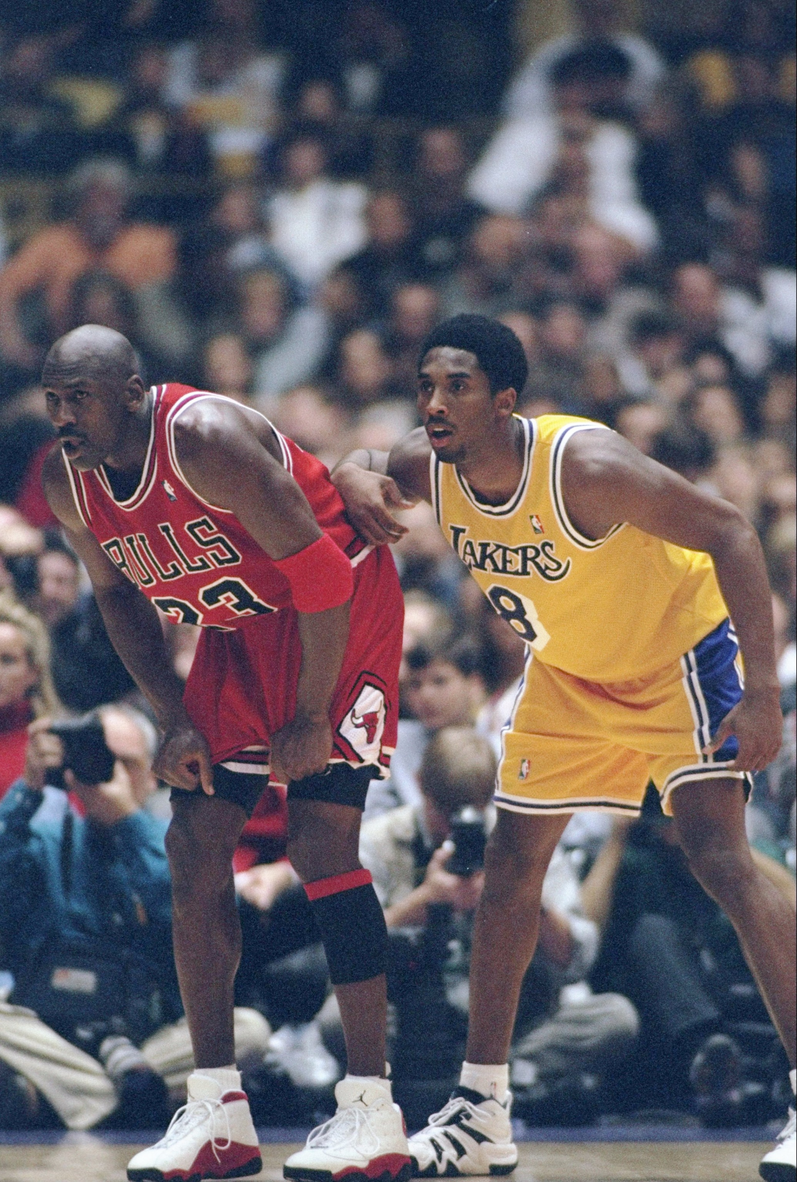 1 Feb 1998: Guard Michael Jordan of the Chicago Bulls (left) and guard Kobe Bryant of the Los Angeles Lakers look on during a game at the Great Western Forum in Inglewood, California. The Lakers won the game, 112-87. Mandatory Credit: Jed Jacobsohn /Al 1 Feb 1998: Guard Michael Jordan of the Chicago Bulls (left) and guard Kobe Bryant of the Los Angeles Lakers look on during a game at the Great Western Forum in Inglewood, California. The Lakers won the game, 112-87. Mandatory Credit: Jed Jacobsohn /Al