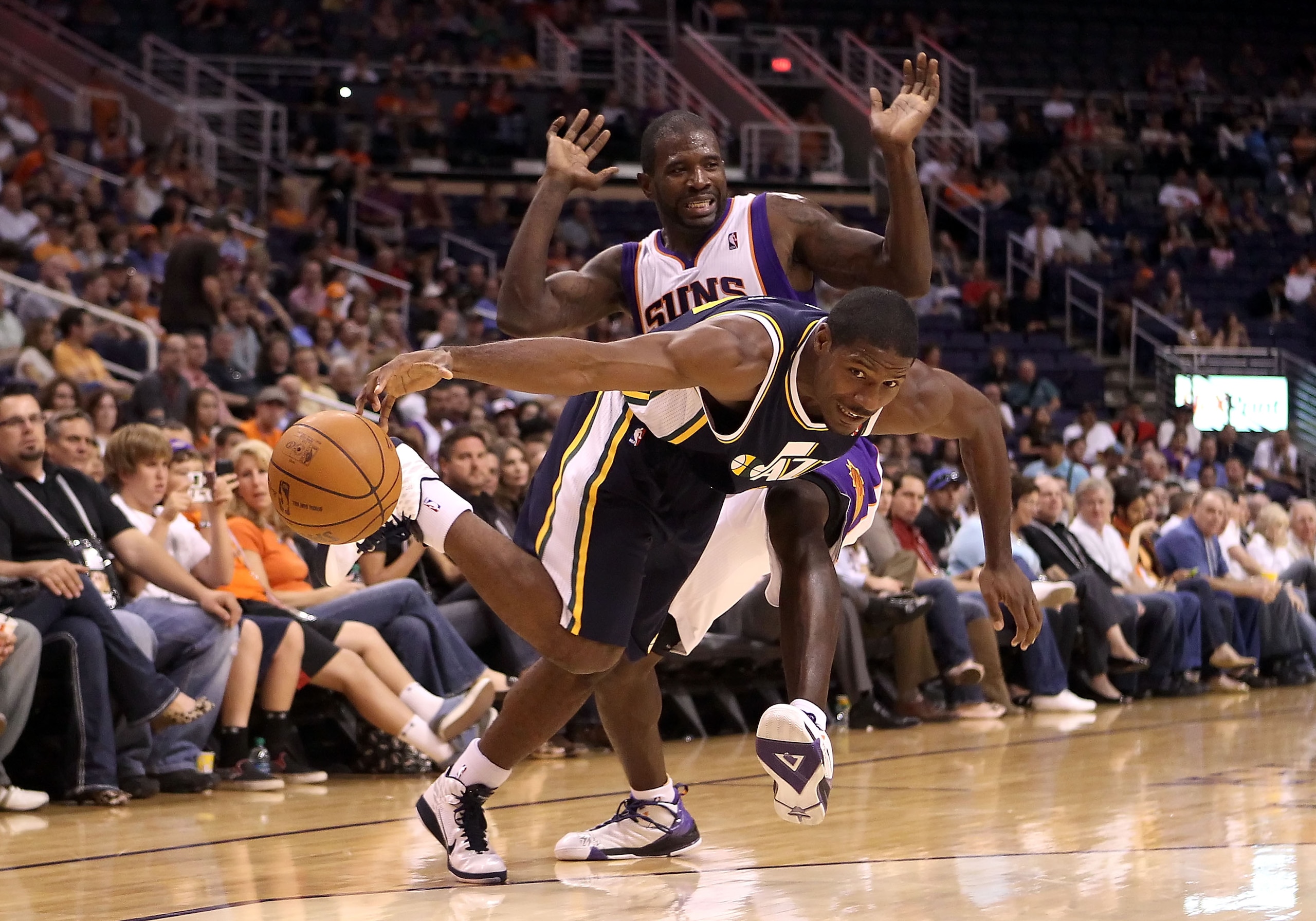 PHOENIX - OCTOBER 12: Othyus Jeffers #6 of the Utah Jazz handles the ball under pressure from Jason Richardson #23 of the Phoenix Suns during the preseason NBA game at US Airways Center on October 12, 2010 in Phoenix, Arizona. NOTE TO USER: User expressl PHOENIX - OCTOBER 12: Othyus Jeffers #6 of the Utah Jazz handles the ball under pressure from Jason Richardson #23 of the Phoenix Suns during the preseason NBA game at US Airways Center on October 12, 2010 in Phoenix, Arizona. NOTE TO USER: User expressl
