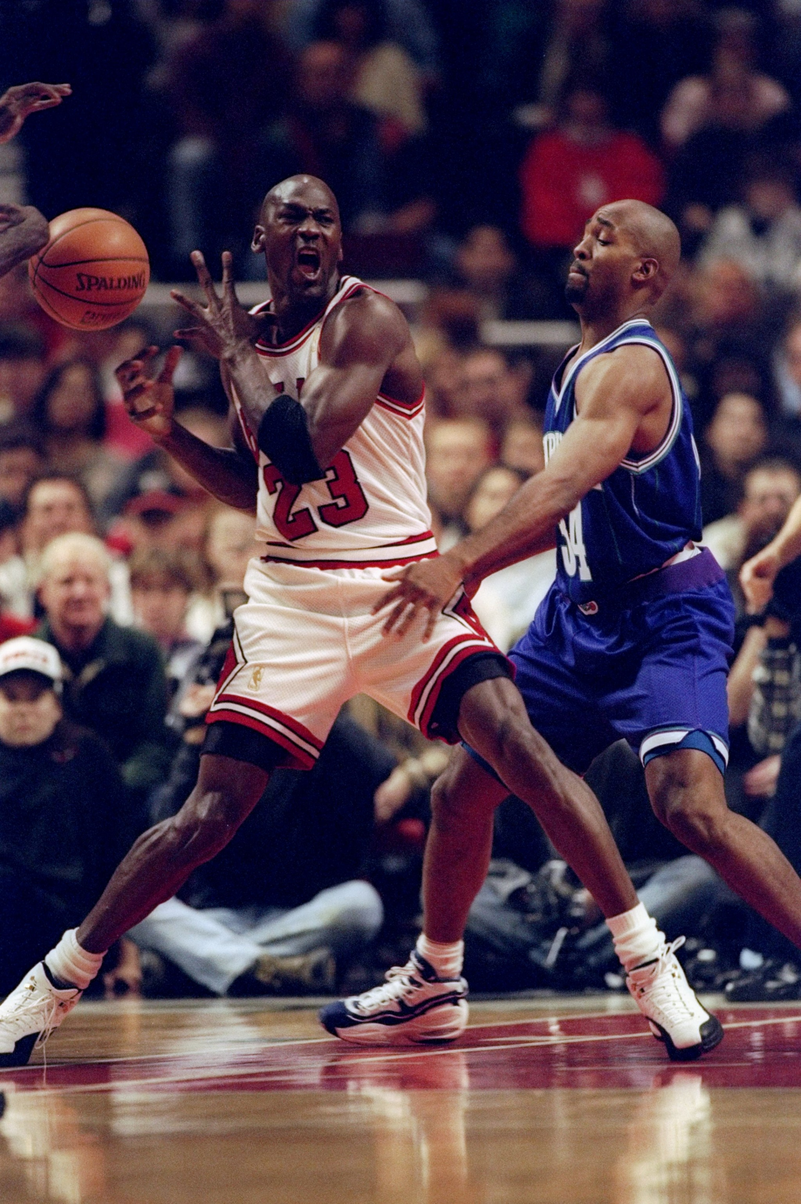 14 Dec 1996: Guard Michael Jordan of the Chicago Bulls (left) moves the ball as Charlotte Hornets guard Tony Smith covers him during a game at the United Center in Chicago, Illinois. The Bulls won the game, 87-82. Mandatory Credit: Jonathan Daniel /All 14 Dec 1996: Guard Michael Jordan of the Chicago Bulls (left) moves the ball as Charlotte Hornets guard Tony Smith covers him during a game at the United Center in Chicago, Illinois. The Bulls won the game, 87-82. Mandatory Credit: Jonathan Daniel /All