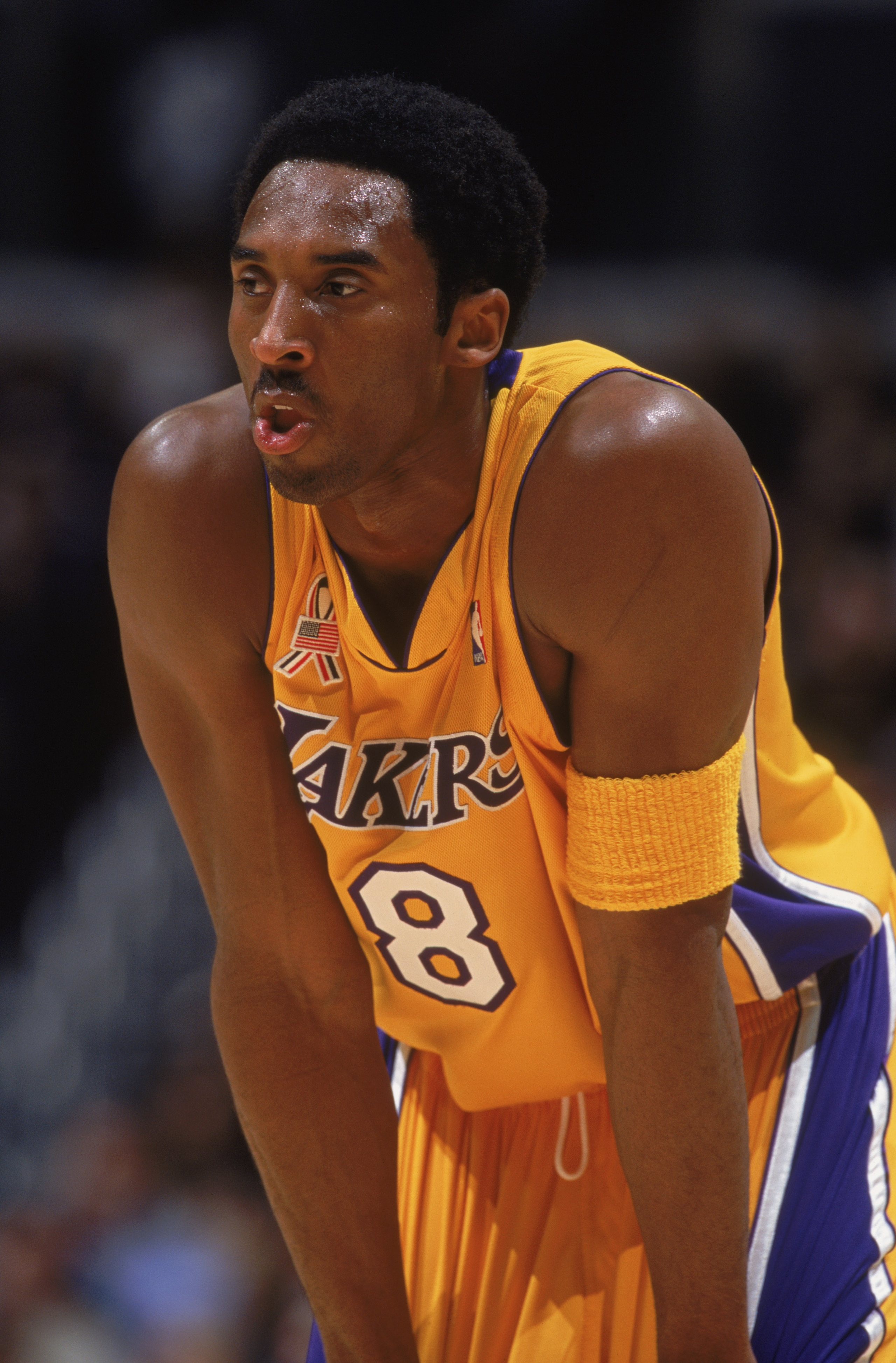 11 Dec 2001: Guard Kobe Bryant #8 of the Los Angeles Lakers rests during the NBA game against the Seattle SuperSonics at the Staples Center in Los Angeles, California. The SuperSonics defeated the Lakers 104-93.Mandatory Credit: Jeff Gross /Getty Images 11 Dec 2001: Guard Kobe Bryant #8 of the Los Angeles Lakers rests during the NBA game against the Seattle SuperSonics at the Staples Center in Los Angeles, California. The SuperSonics defeated the Lakers 104-93.Mandatory Credit: Jeff Gross /Getty Images
