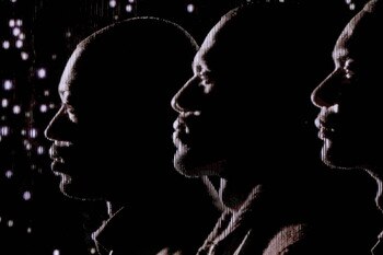 MIAMI, FL - MARCH 19:  The images of (L-R) Dwyane Wade, LeBron James and Chris Bosh of the Miami Heat appear on the jumbo screen as they are introduced against the Denver Nuggets at American Airlines Arena on March 19, 2011 in Miami, Florida. NOTE TO USER