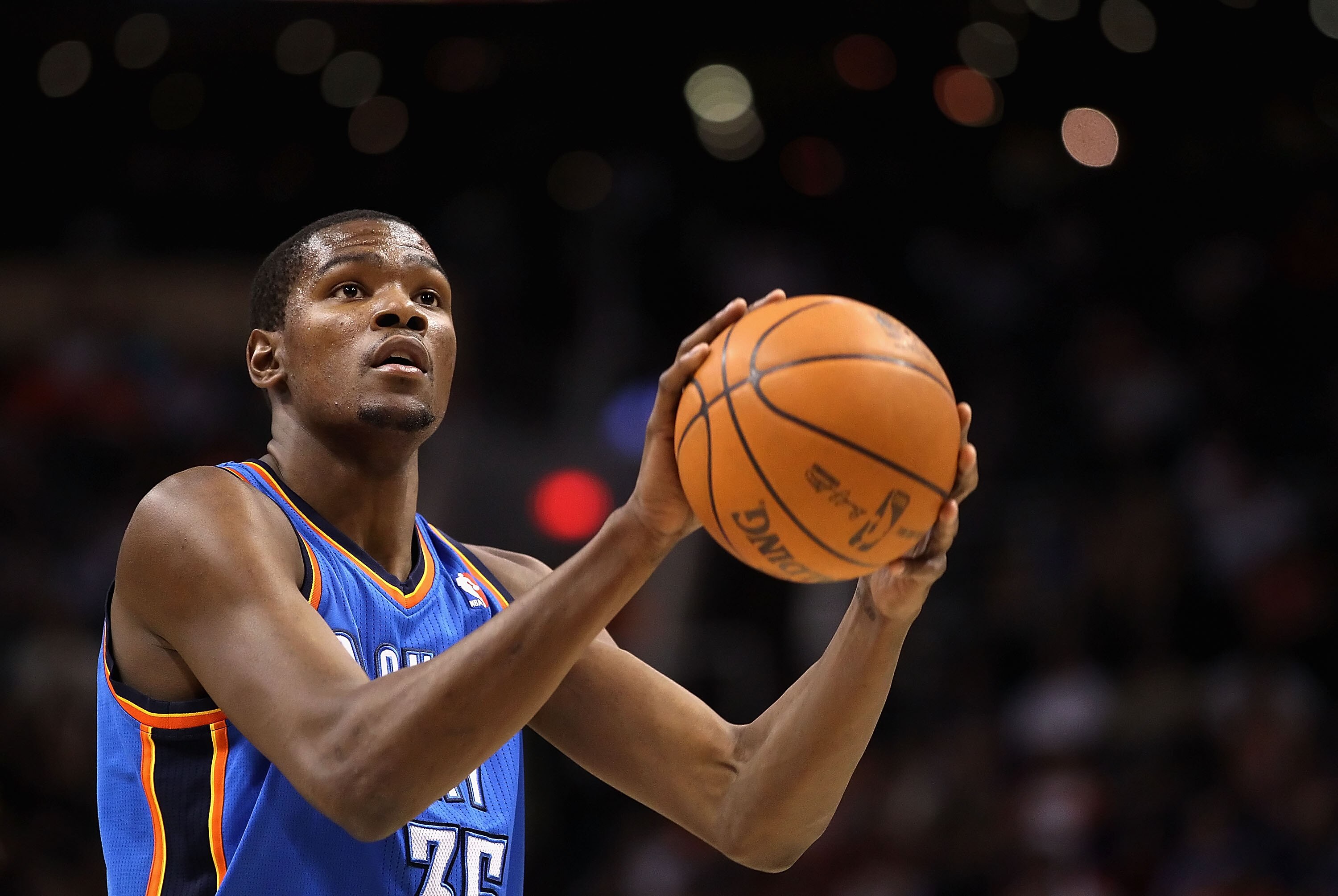 PHOENIX, AZ - MARCH 30:  Kevin Durant #35 of the Oklahoma City Thunder shoots a free throw shot during the NBA game against the Phoenix Suns at US Airways Center on March 30, 2011 in Phoenix, Arizona. The Thunder defeated the Suns 116-98.   NOTE TO USER: