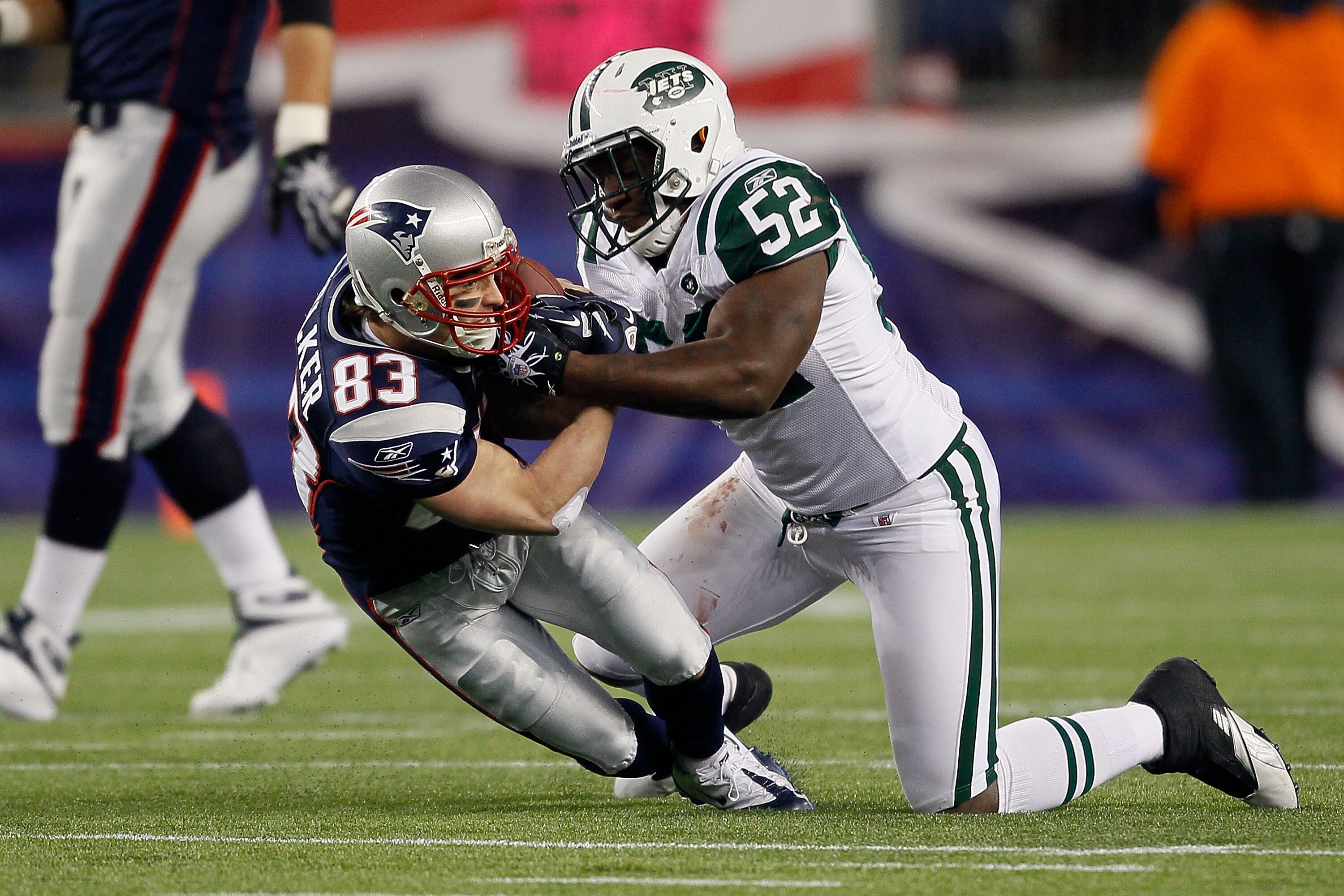 FOXBORO, MA - DECEMBER 06:  Wes Welker #83 of the New England Patriots makes a reception in the first half against David Harris #52 of the New York Jets at Gillette Stadium on December 6, 2010 in Foxboro, Massachusetts.  (Photo by Jim Rogash/Getty Images)