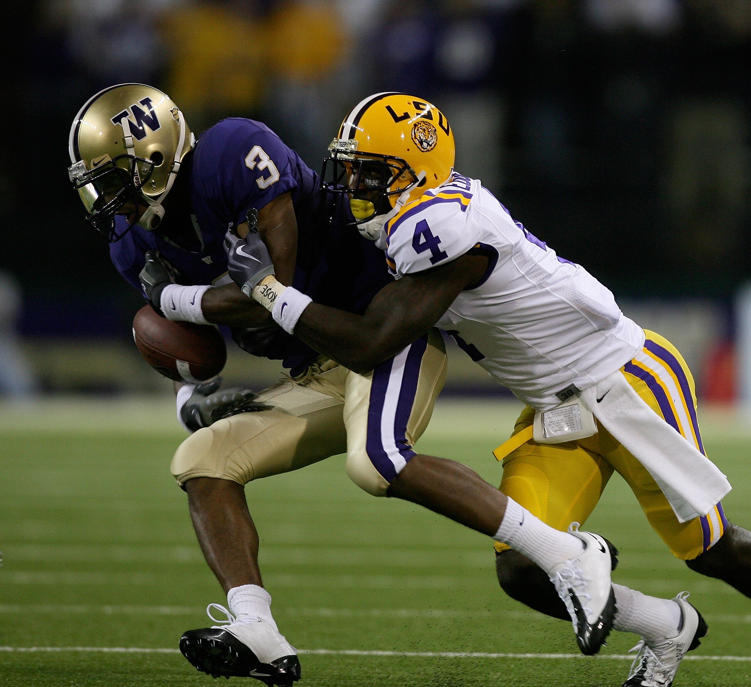 SEATTLE - SEPTEMBER 05: Wide receiver James Johnson #3 of the Washington Huskies makes a catch against Jai Eugene #4 of the LSU Tigers on September 5, 2009 at Husky Stadium in Seattle, Washington. The Tigers defeated the Huskies 31-23. (Photo by Otto Gre SEATTLE - SEPTEMBER 05: Wide receiver James Johnson #3 of the Washington Huskies makes a catch against Jai Eugene #4 of the LSU Tigers on September 5, 2009 at Husky Stadium in Seattle, Washington. The Tigers defeated the Huskies 31-23. (Photo by Otto Gre