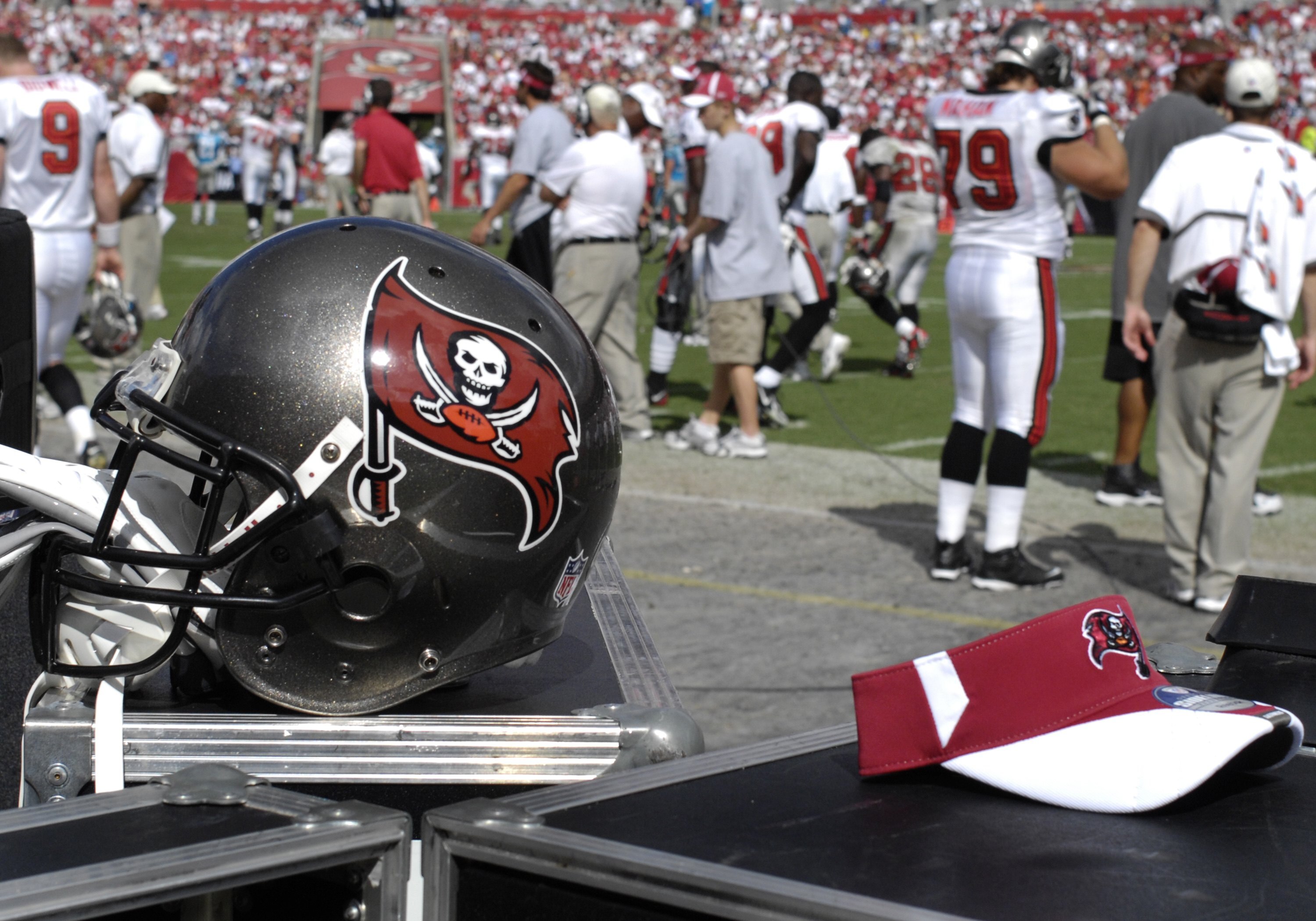 TAMPA, FL - OCTOBER 12: A helmet and team visor behind the bench  as the Tampa Bay Buccaneers host the Carolina Panthers at Raymond James Stadium on October 12, 2008 in Tampa, Florida.  (Photo by Al Messerschmidt/Getty Images)