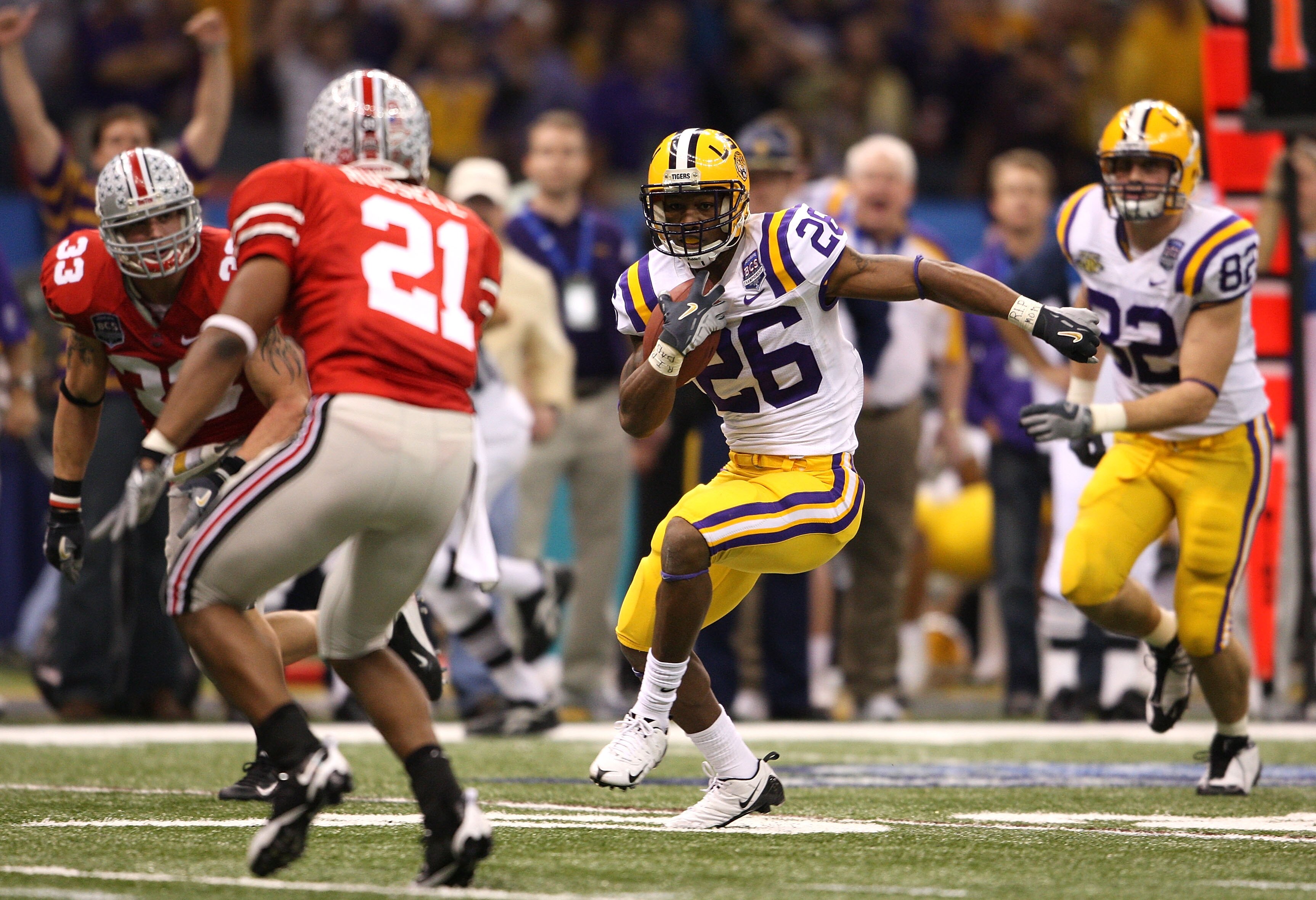 NEW ORLEANS - JANUARY 07:  Richard Murphy #26 of the Louisiana State University Tigers runs the ball against Anderson Russell #21 of the Ohio State Buckeyes during the AllState BCS National Championship on January 7, 2008 at the Louisiana Superdome in New