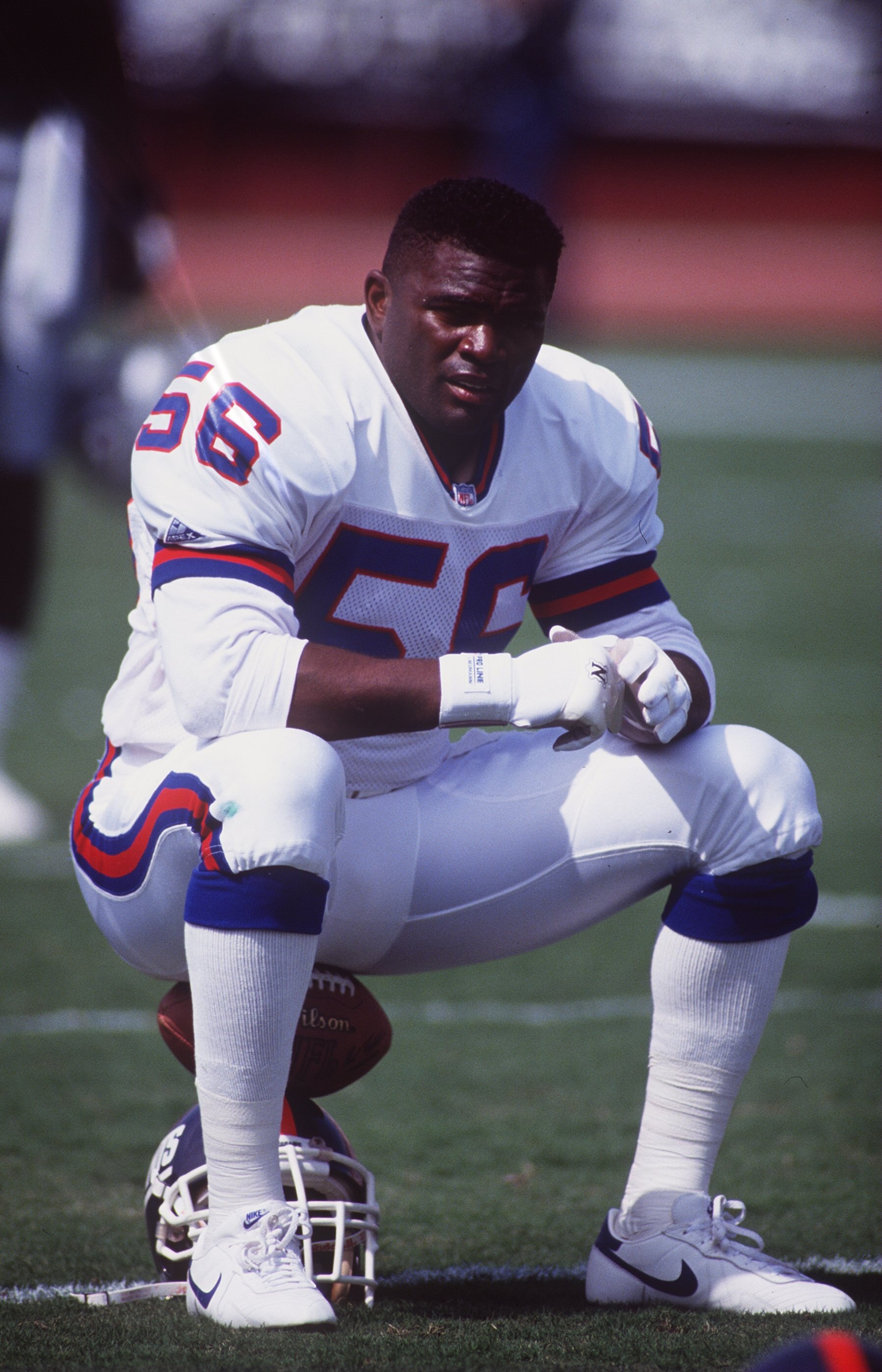 4 SEP 1992:  NEW YORK GIANTS LINEBACKER LAWRENCE TAYLOR RELAXES BEFORE THEIR 13-10 WIN OVER THE LOS ANGELES RAIDERS AT THE LOS ANGELESCOLISEUM IN LOS ANGELES, CALIFORNIA. Mandatory Credit: Ken Levine/ALLSPORT
