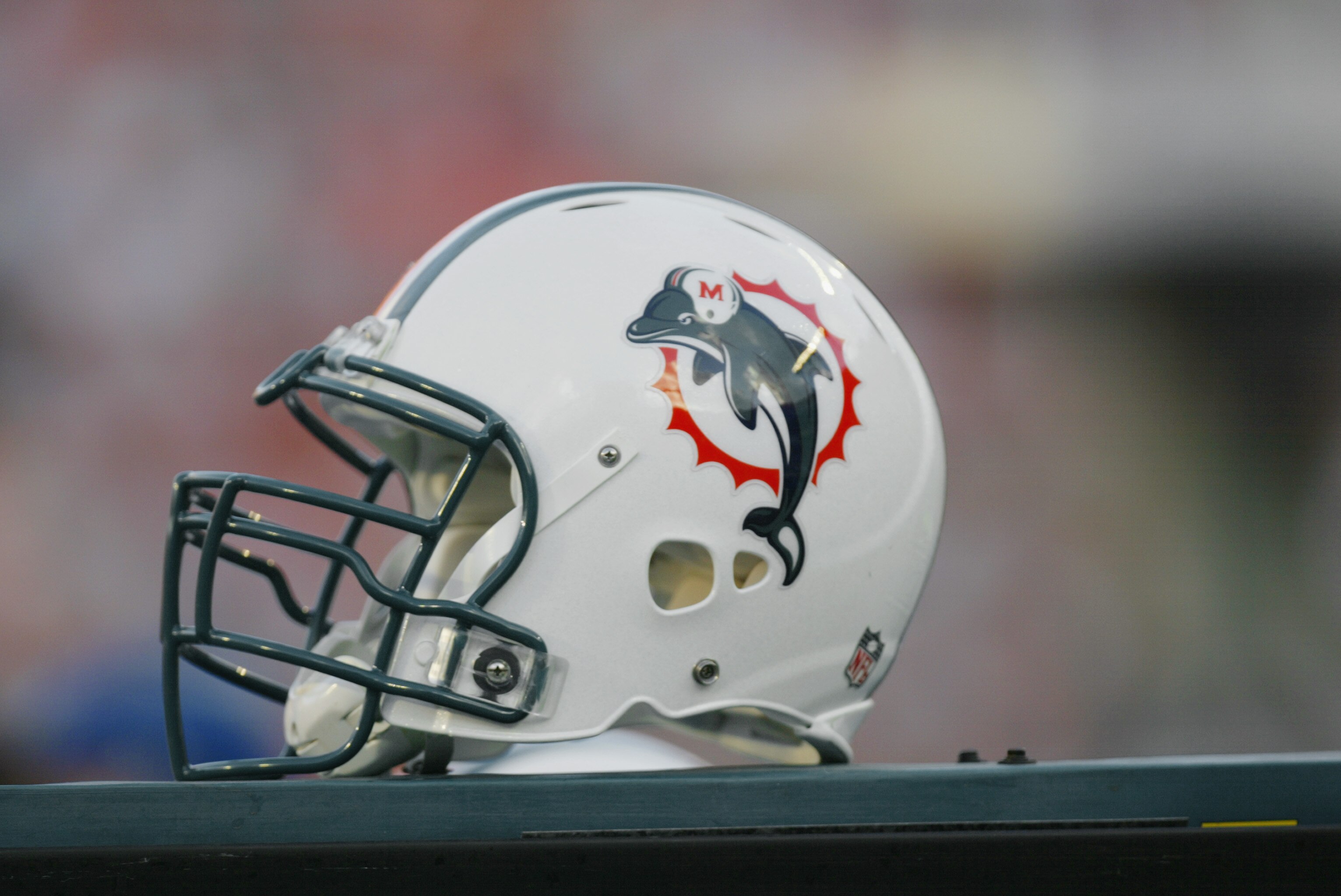 MIAMI - AUGUST 15:  Detail of the helmet of a member of the Miami Dolphins before the NFL preseason game against the New Orleans Saints on August 15, 2002 at Pro Player Stadium in Miami, Florida.  The Saints won 24-7.  (Photo By Eliot J. Schechter/Getty I