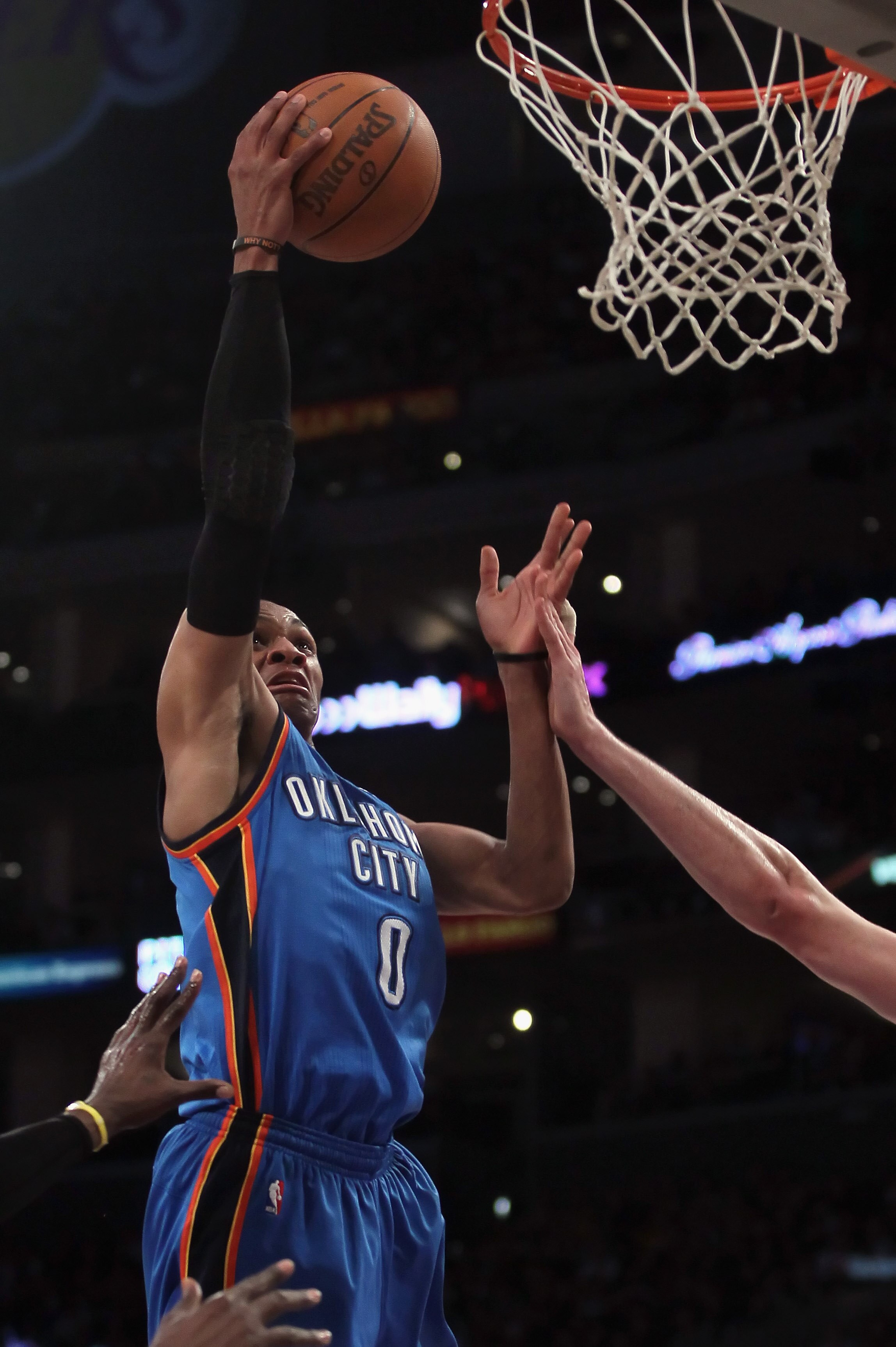 LOS ANGELES, CA - APRIL 10:  Russell Westbrook #0 of the Oklahoma City Thunder drives to the basket for a layup in the second half against the Los Angeles Lakers at Staples Center on April 10, 2011 in Los Angeles, California. The Thunder defeated the Lake