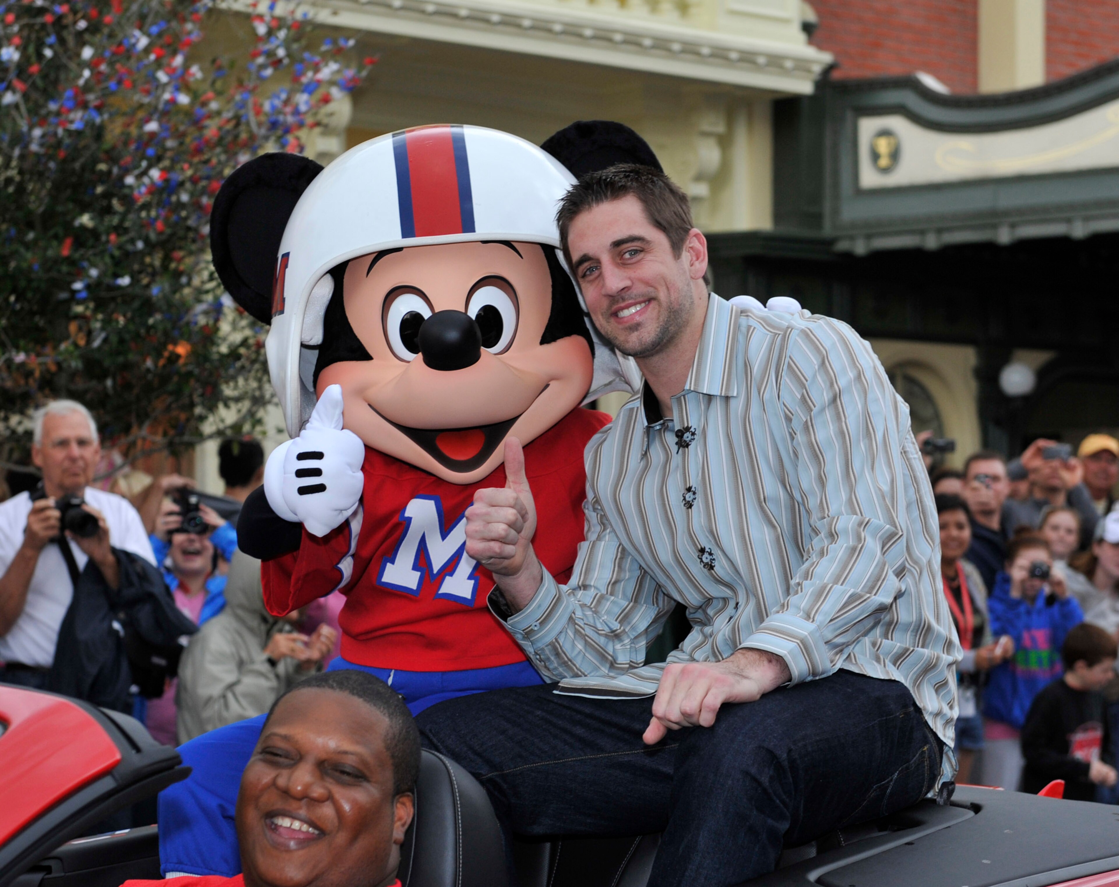 LAKE BUENA VISTA, FL - FEBRUARY 07: In this handout photo provided by Disney, Super Bowl XLV Most Valuable Player Aaron Rodgers takes a celebratory ride with Mickey Mouse, following the Green Bay Packers' 31-25 victory over the Pittsburgh Steelers Februa LAKE BUENA VISTA, FL - FEBRUARY 07: In this handout photo provided by Disney, Super Bowl XLV Most Valuable Player Aaron Rodgers takes a celebratory ride with Mickey Mouse, following the Green Bay Packers' 31-25 victory over the Pittsburgh Steelers Februa