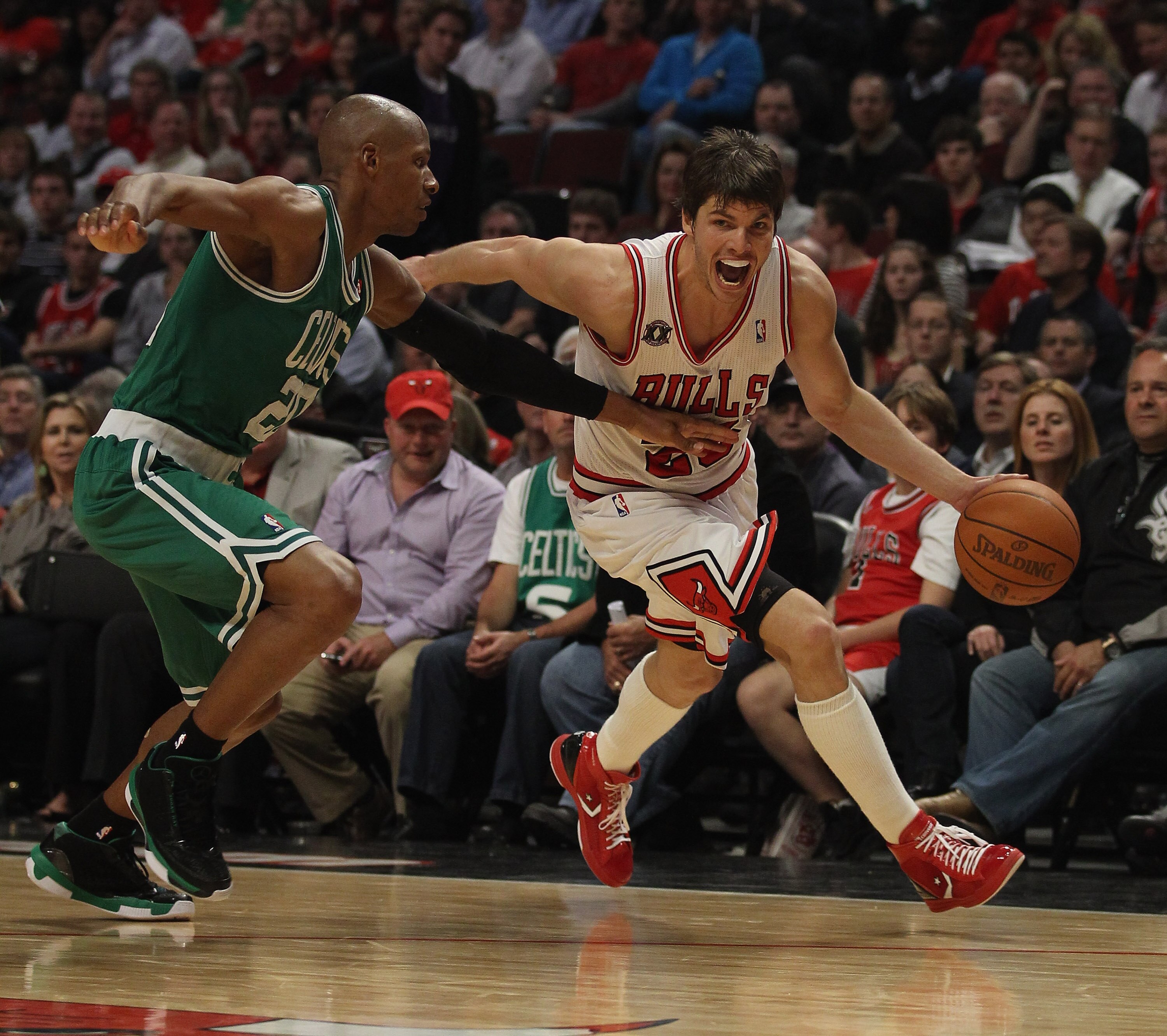 CHICAGO, IL - APRIL 07: Kyle Korver #26 of the Chicago Bulls drives against Ray Allen #20 of the Boston Celtics at United Center on April 7, 2011 in Chicago, Illinois. The Bulls defeated the Celtics 97-81. NOTE TO USER: User expressly acknowledges and agr