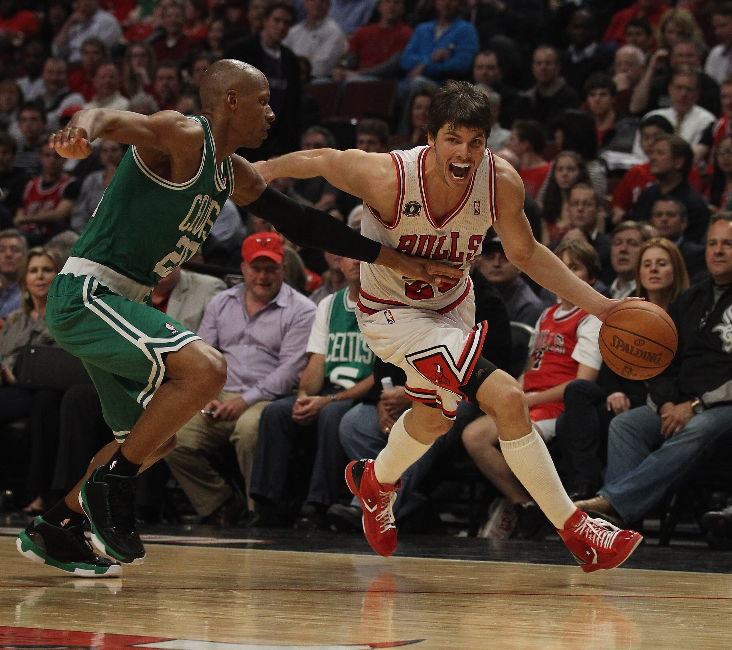 CHICAGO, IL - APRIL 07: Kyle Korver #26 of the Chicago Bulls drives against Ray Allen #20 of the Boston Celtics at United Center on April 7, 2011 in Chicago, Illinois. The Bulls defeated the Celtics 97-81. NOTE TO USER: User expressly acknowledges and agr