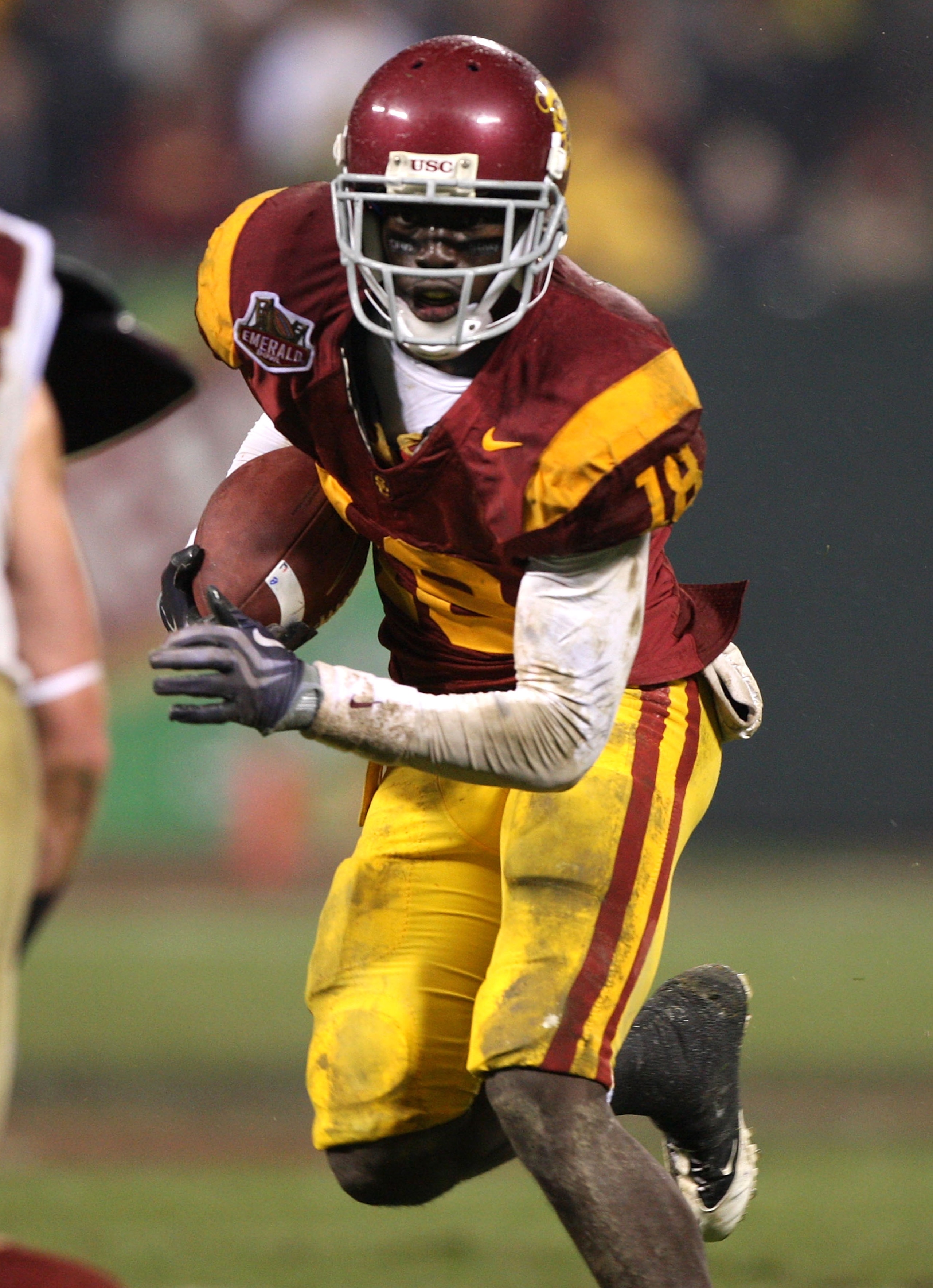 SAN FRANCISCO - DECEMBER 26: Damian Williams #18 of the USC Trojans runs after a catch against the Boston College Eagles during the 2009 Emerald Bowl at AT&T Park on December 26, 2009 in San Francisco, California. (Photo by Jed Jacobsohn/Getty Images)