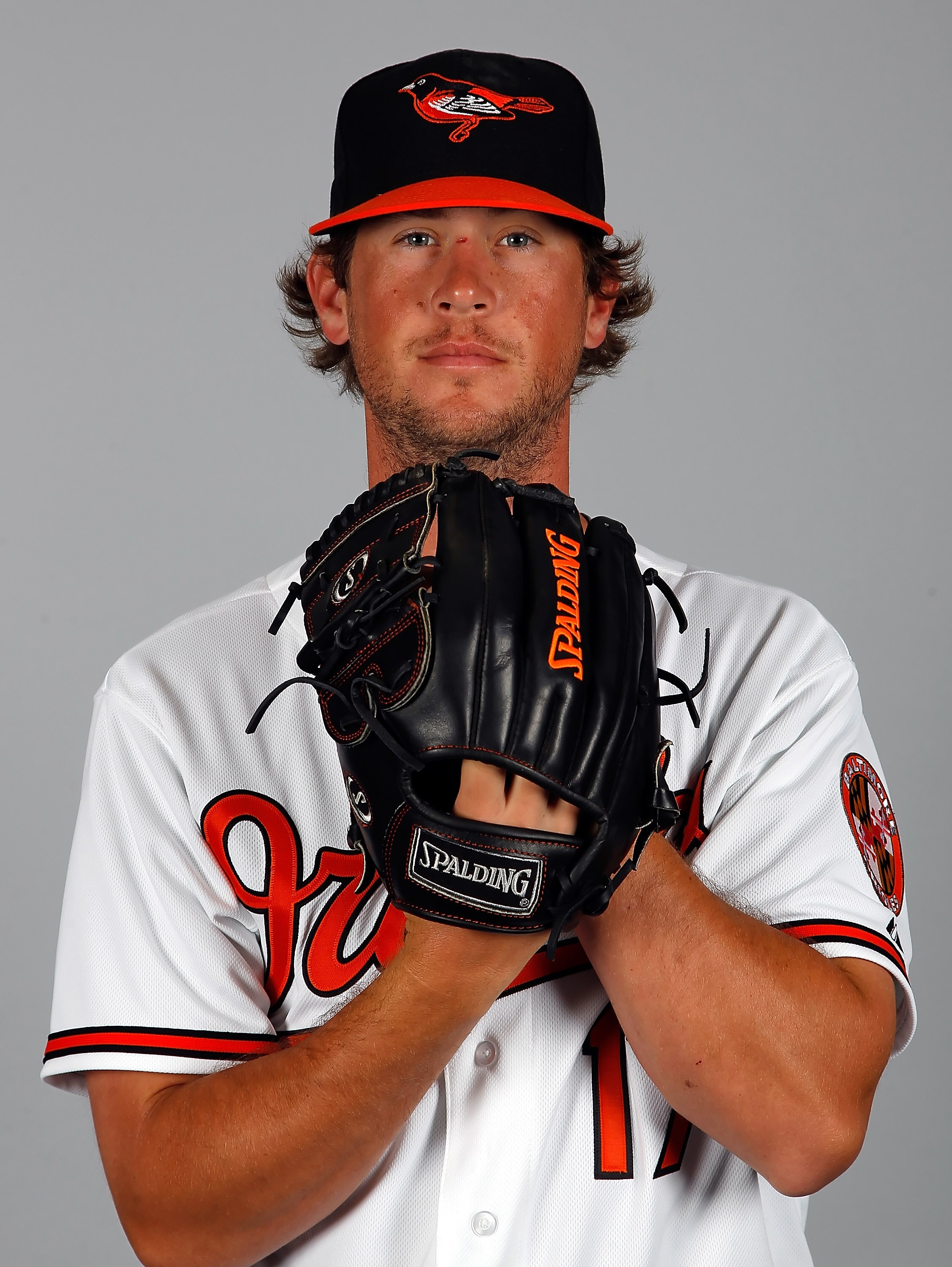 SARASOTA, FL - FEBRUARY 26:  Pitcher Brian Matusz #17 of the Baltimore Orioles poses for a photo during photo day at Ed Smith Stadium on February 26, 2011 in Sarasota, Florida.  (Photo by J. Meric/Getty Images)