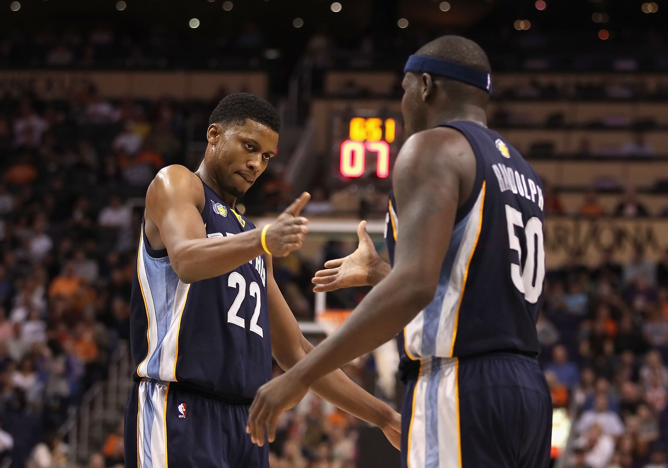 PHOENIX - DECEMBER 08: Rudy Gay #22 of the Memphis Grizzlies high fives teammate Zach Randolph #50 after scoring against the Phoenix Suns during the NBA game at US Airways Center on December 8, 2010 in Phoenix, Arizona. The Grizzlies defeated the Suns 10 PHOENIX - DECEMBER 08: Rudy Gay #22 of the Memphis Grizzlies high fives teammate Zach Randolph #50 after scoring against the Phoenix Suns during the NBA game at US Airways Center on December 8, 2010 in Phoenix, Arizona. The Grizzlies defeated the Suns 10