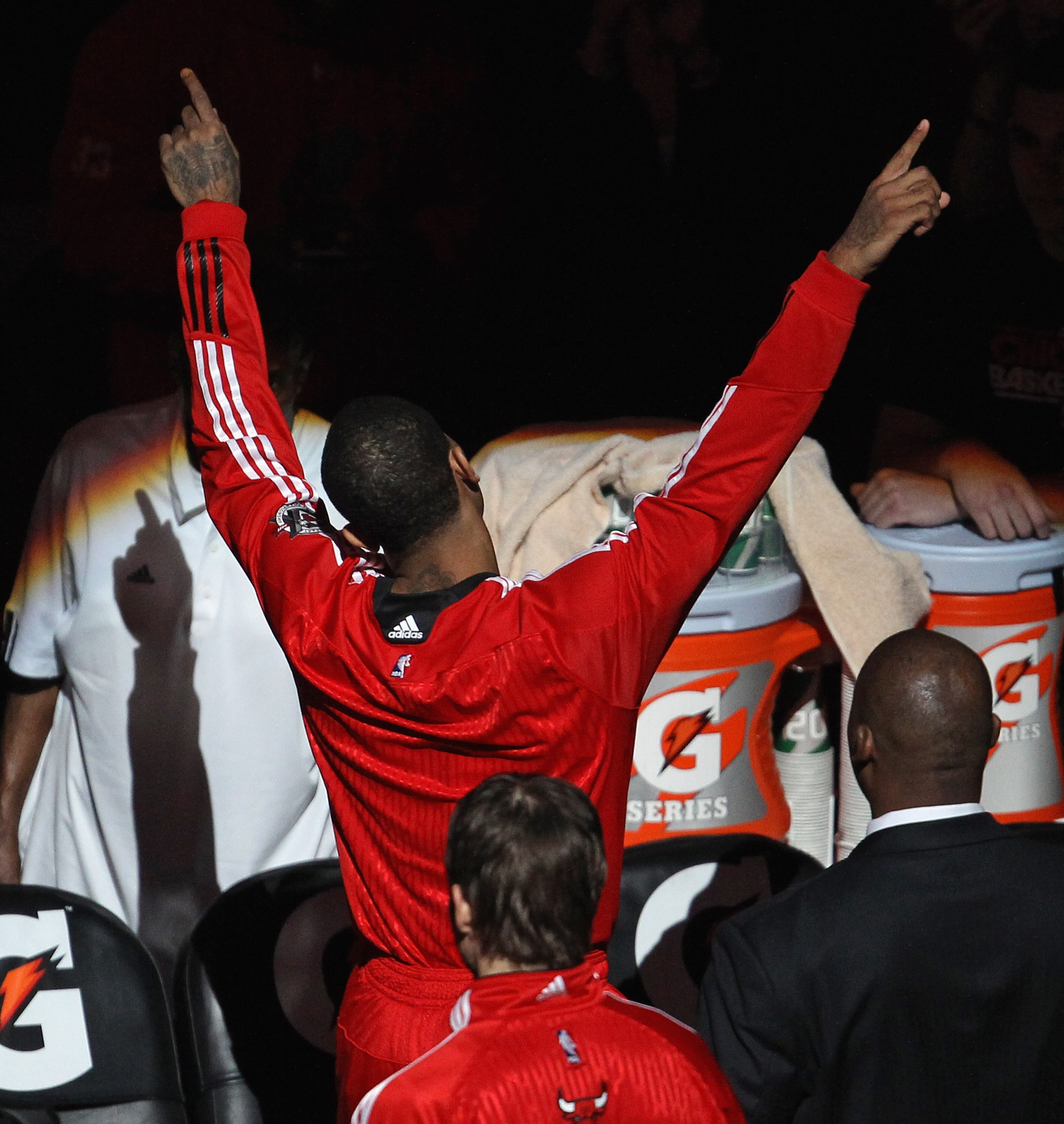 CHICAGO, IL - APRIL 13: Derrick Rose #1 of the Chicago Bulls acknowledges the crowd during player introductions before a game against the New Jersey Nets at United Center on April 13, 2011 in Chicago, Illinois. NOTE TO USER: User expressly acknowledges an