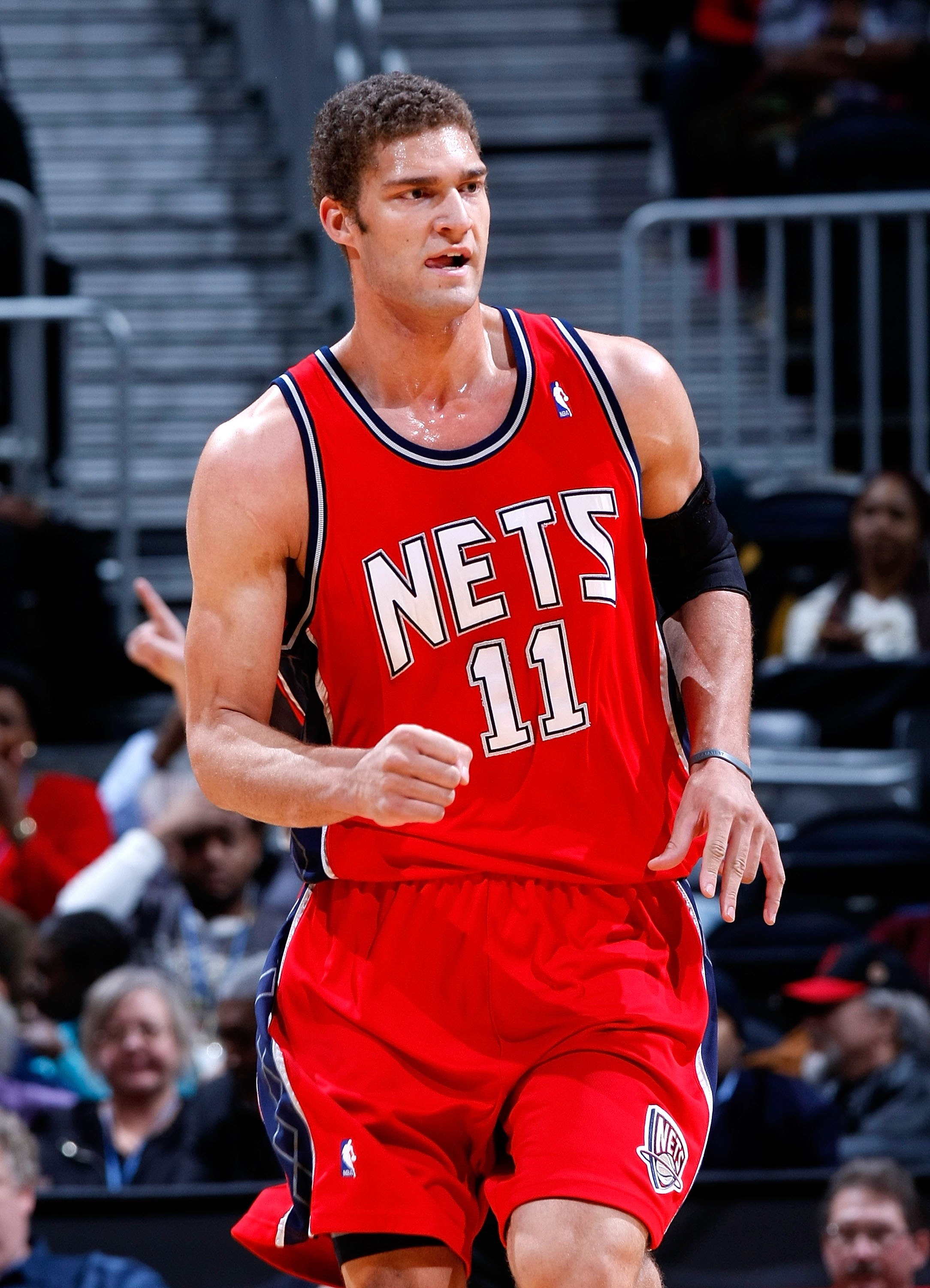 ATLANTA - JANUARY 06:  Brook Lopez #11 of the New Jersey Nets against the Atlanta Hawks at Philips Arena on January 6, 2010 in Atlanta, Georgia.  NOTE TO USER: User expressly acknowledges and agrees that, by downloading and/or using this Photograph, User