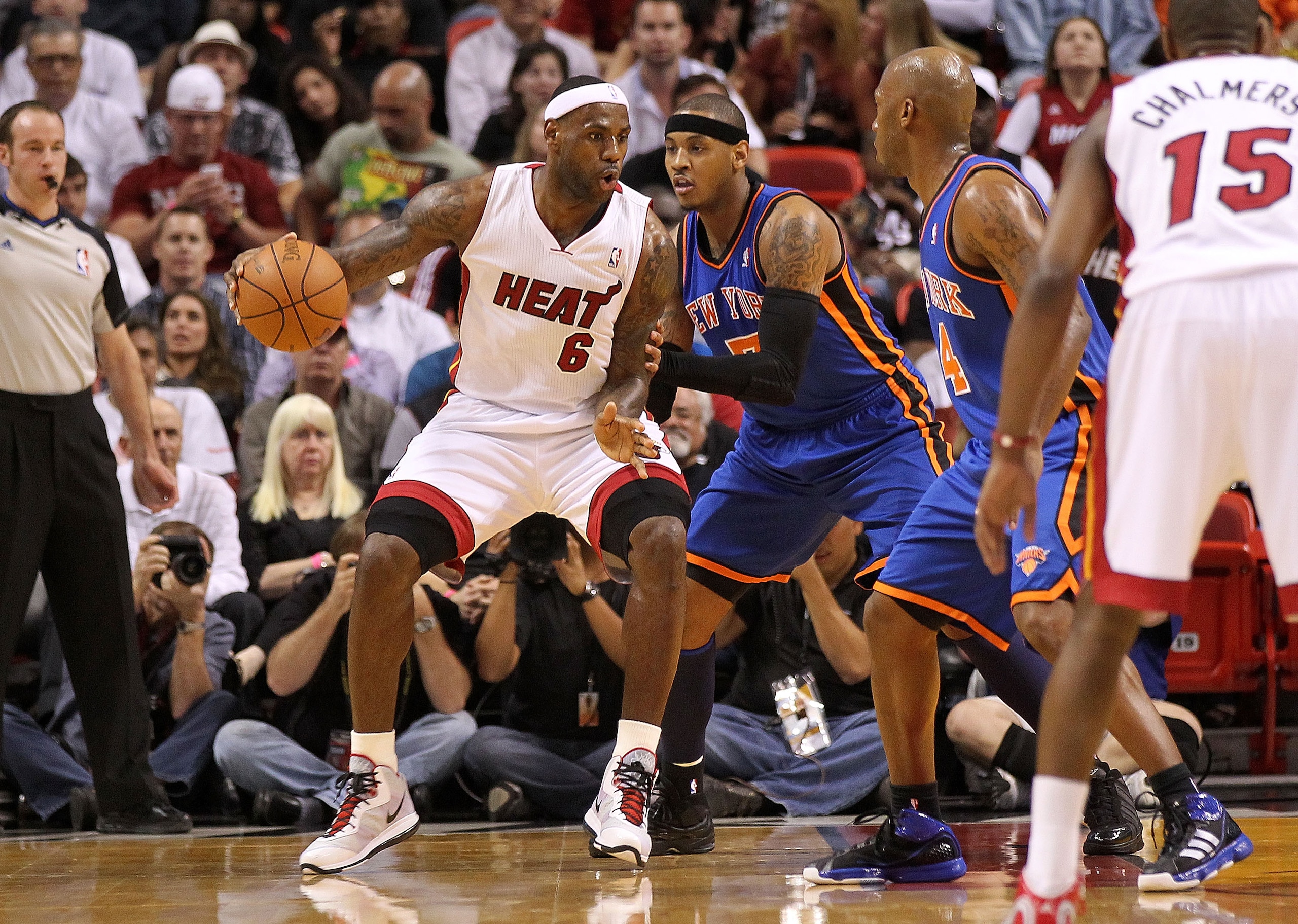 MIAMI, FL - FEBRUARY 27:  LeBron James #6 of the Miami Heat is guarded by Carmelo Anthony #7 of the New York Knicks looks on during a game at American Airlines Arena on February 27, 2011 in Miami, Florida. NOTE TO USER: User expressly acknowledges and agr
