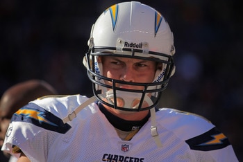 DENVER - JANUARY 02:  Quarterback Philip Rivers #17 of the San Diego Chargers takes the field against the Denver Broncos at INVESCO Field at Mile High on January 2, 2011 in Denver, Colorado. The Chargers defeated the Broncos 33-28.  (Photo by Doug Pensing