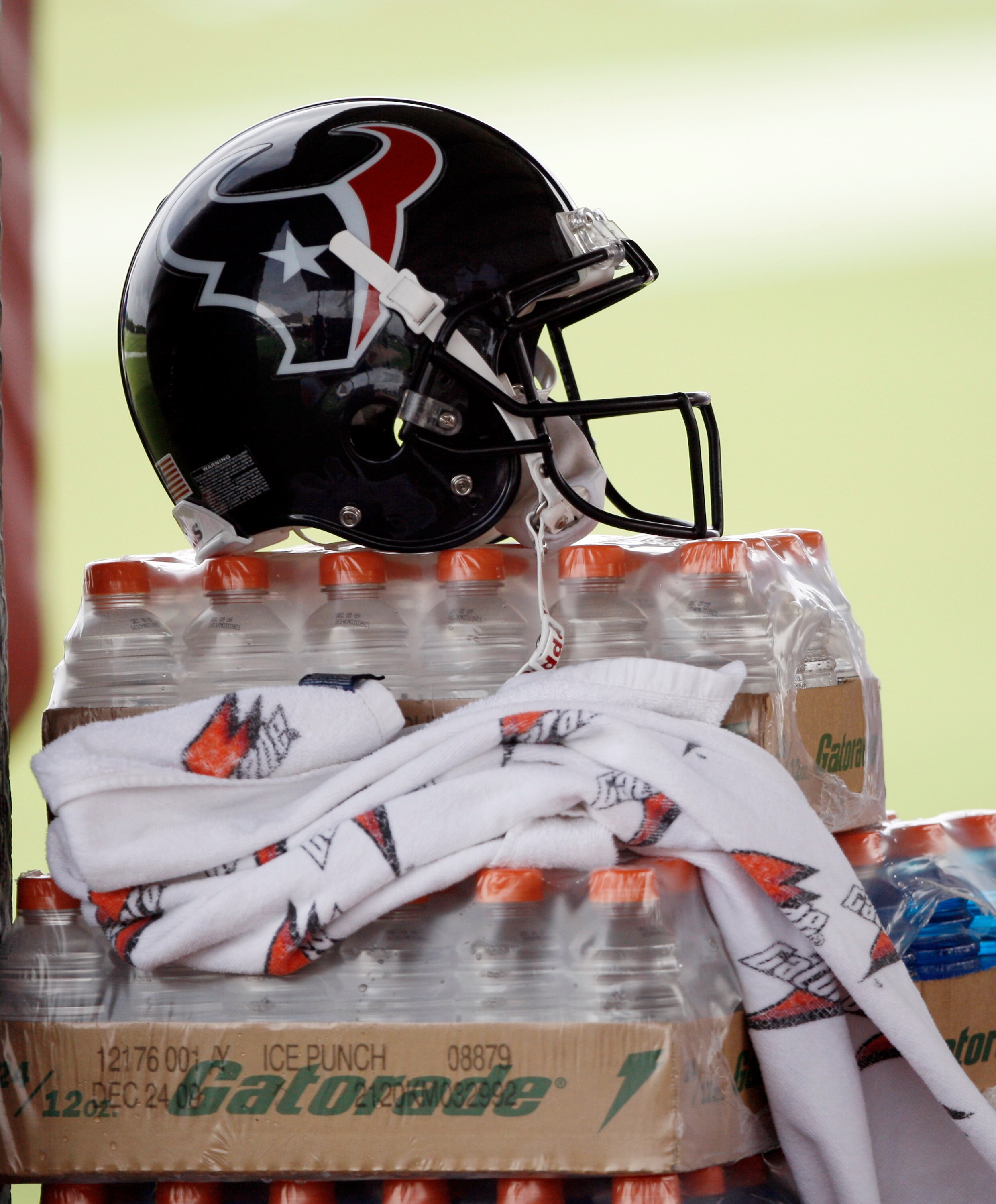 HOUSTON - JULY 31:  A Houston Texans helmet sits on a stack of Gatorade during practice on July 31, 2009 in Houston, Texas.  (Photo by Bob Levey/Getty Images)