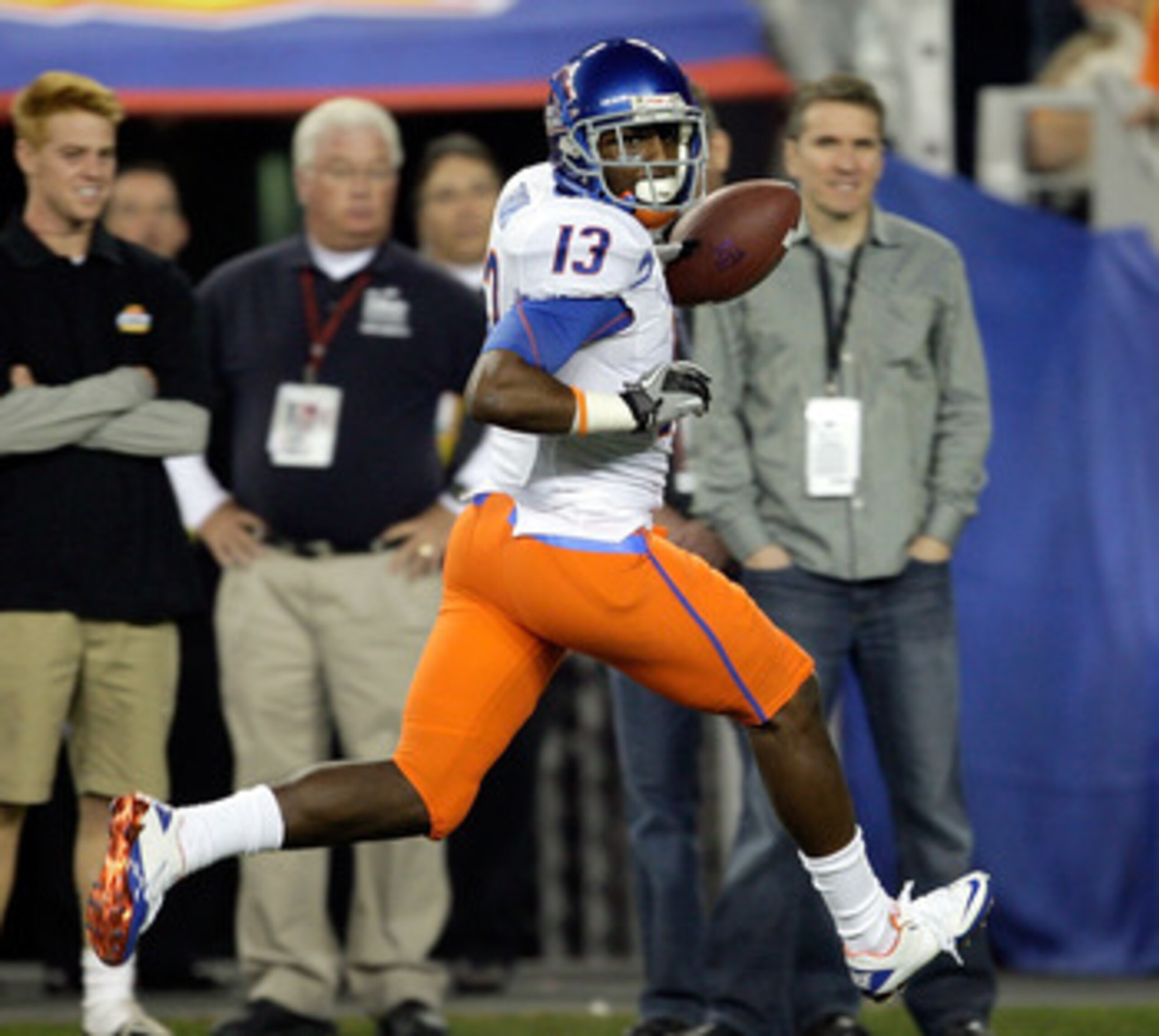 GLENDALE, AZ - JANUARY 04:  Brandyn Thompson #13 of the Boise State Broncos runs into the endzone after a 50-yard interception return for a touchdown in the first quarter against the TCU Horned Frogs during the Tostitos Fiesta Bowl at the Universtity of P