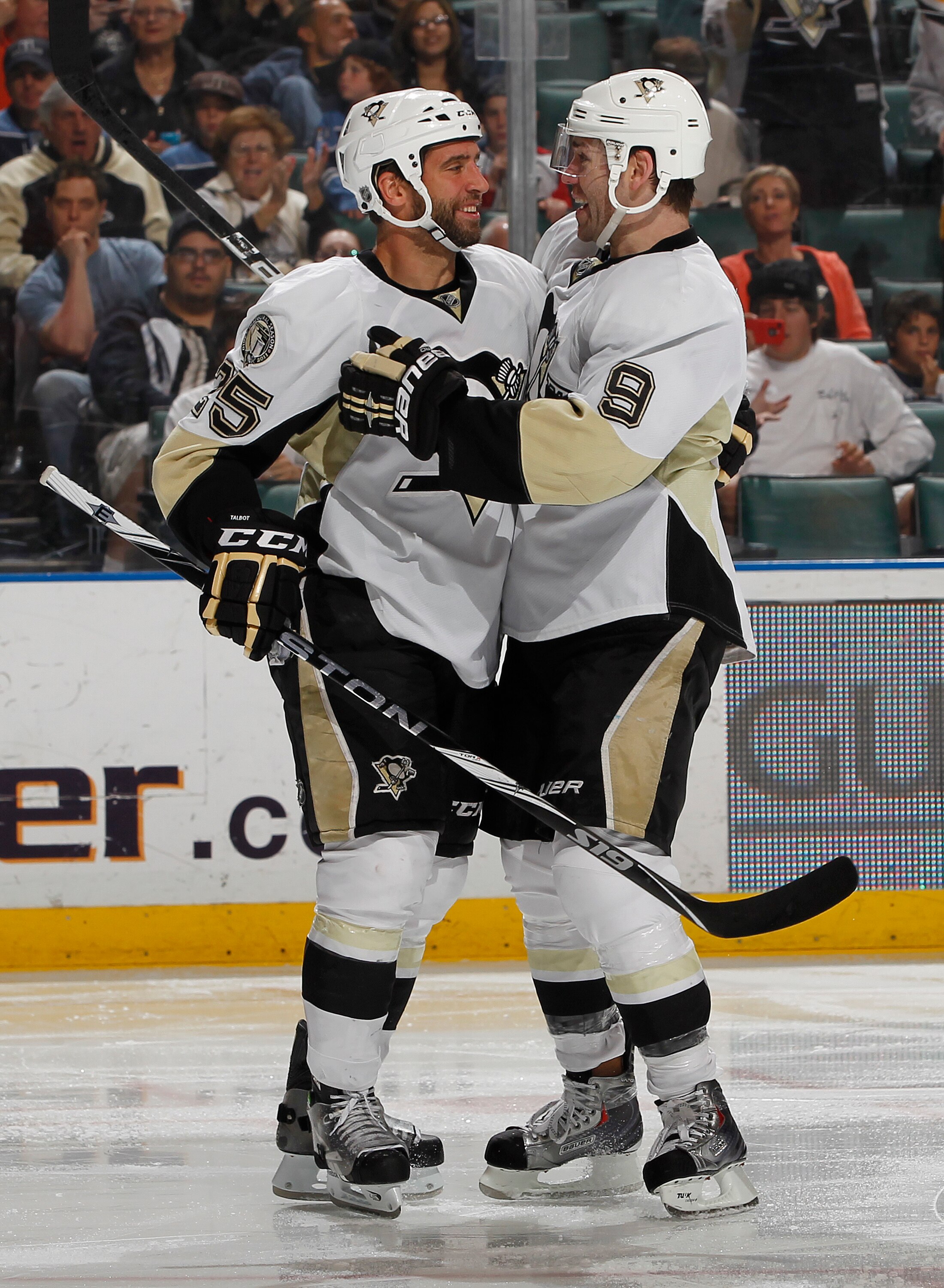 SUNRISE, FL - APRIL 2: Pascal Dupuis #9 is congratulated by Maxime Talbot #25 of the Pittsburgh Penguins after scoring a goal to tie the game against the Florida Panthers on April 2, 2011 at the BankAtlantic Center in Sunrise, Florida. (Photo by Joel Auer