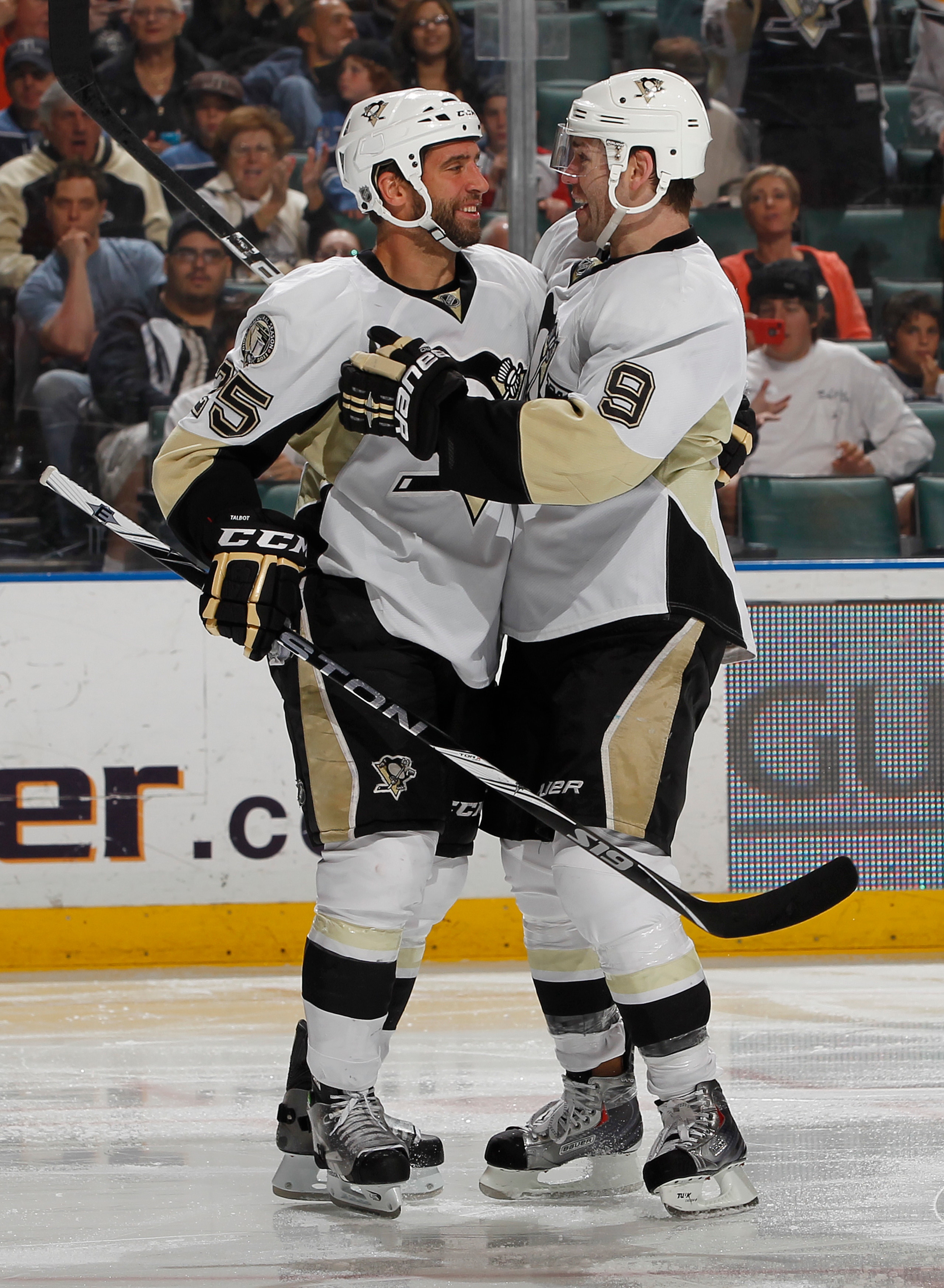 SUNRISE, FL - APRIL 2: Pascal Dupuis #9 is congratulated by Maxime Talbot #25 of the Pittsburgh Penguins after scoring a goal to tie the game against the Florida Panthers on April 2, 2011 at the BankAtlantic Center in Sunrise, Florida. (Photo by Joel Auer