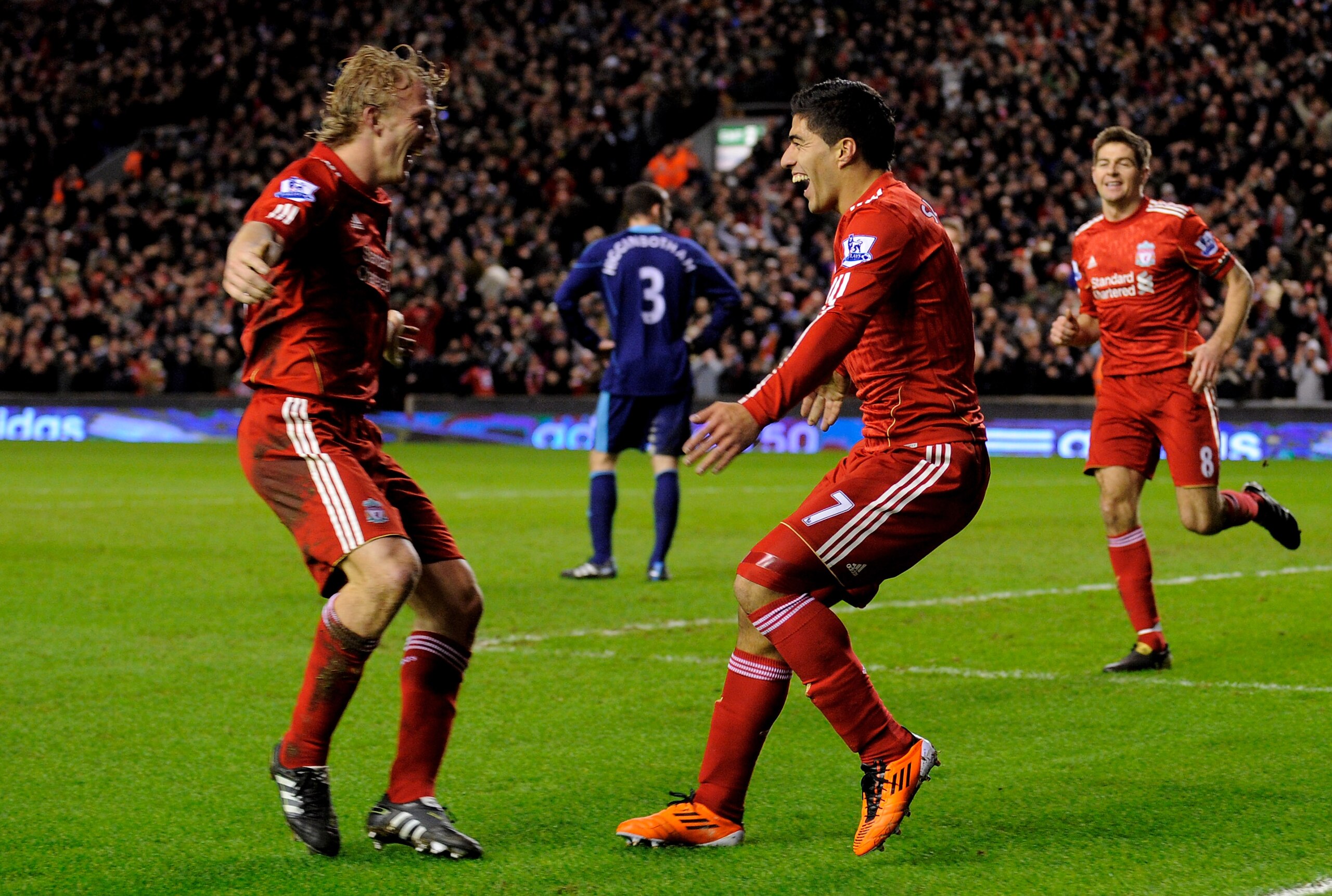 LIVERPOOL, ENGLAND - FEBRUARY 02: Luis Suarez of Liverpool celebrates with team-mate Dirk Kuyt (L) after scoring the 2-0 goal during the Barclays Premier League match between Liverpool and Stoke City at Anfield on February 2, 2011 in Liverpool, England. ( LIVERPOOL, ENGLAND - FEBRUARY 02: Luis Suarez of Liverpool celebrates with team-mate Dirk Kuyt (L) after scoring the 2-0 goal during the Barclays Premier League match between Liverpool and Stoke City at Anfield on February 2, 2011 in Liverpool, England. (
