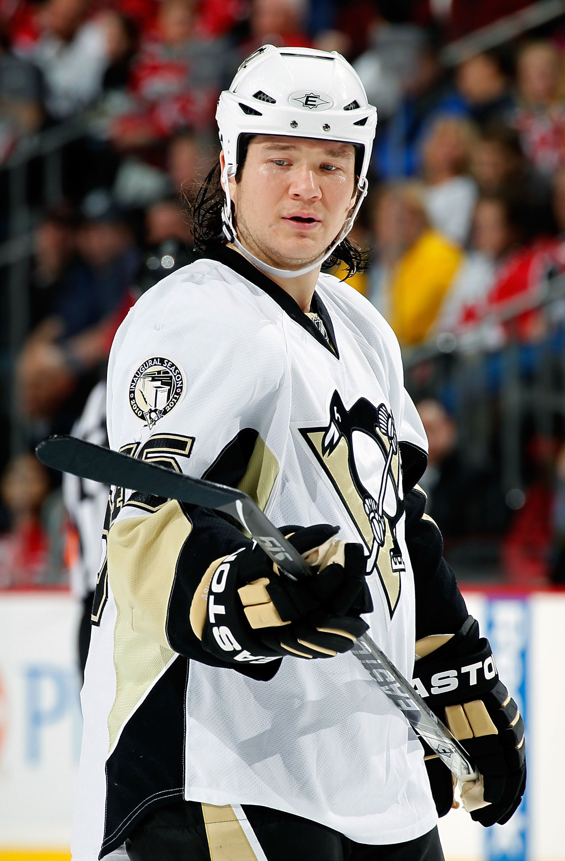 NEWARK, NJ - JANUARY 20:  Arron Asham #45 of the Pittsburgh Penguins checks his stick as he waits for a faceoff during an NHL hockey game against the New Jersey Devils at the Prudential Center on January 20, 2011 in Newark, New Jersey.  (Photo by Paul Ber