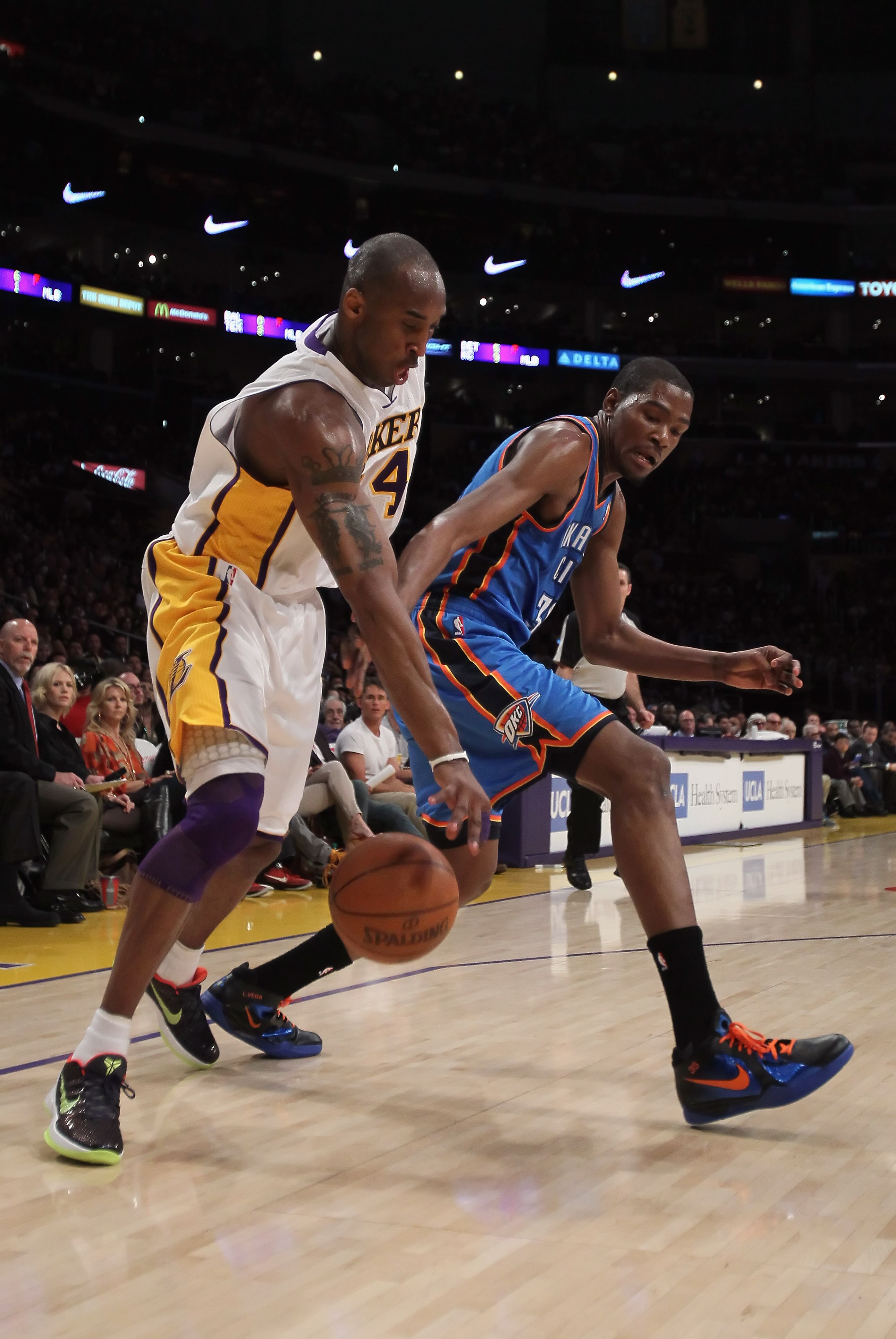 LOS ANGELES, CA - APRIL 10:  Kobe Bryant #24 of the Los Angeles Lakers steals the ball from Kevin Durant #35 of the Oklahoma City Thunder in the first half at Staples Center on April 10, 2011 in Los Angeles, California. The Thunder defeated the Lakers 120
