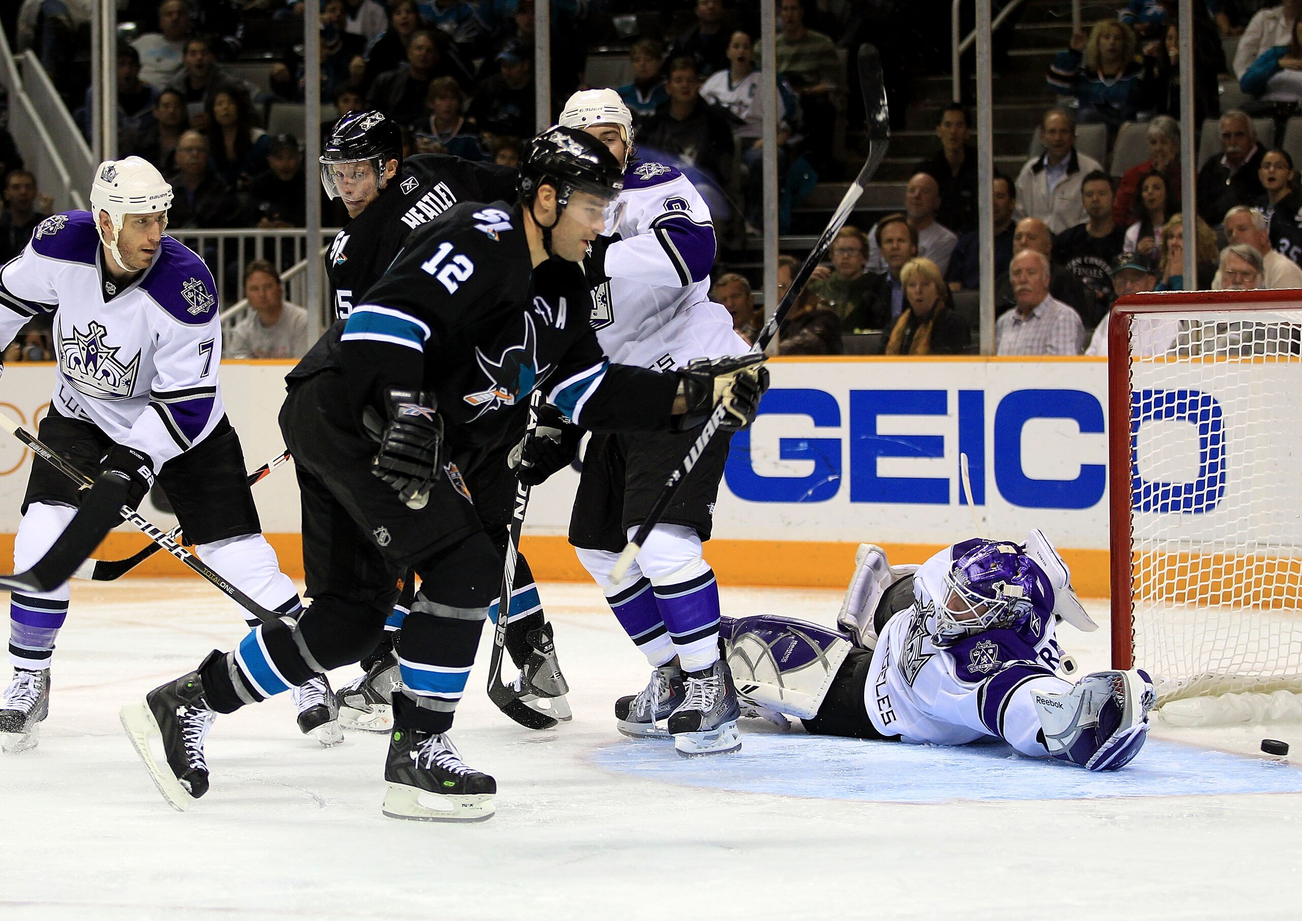 SAN JOSE, CA - NOVEMBER 15:  Patrick Marleau #12 of the San Jose Sharks scores a goal past a diving Jonathan Bernier #45 of the Los Angeles Kings at HP Pavilion on November 15, 2010 in San Jose, California.  (Photo by Ezra Shaw/Getty Images)